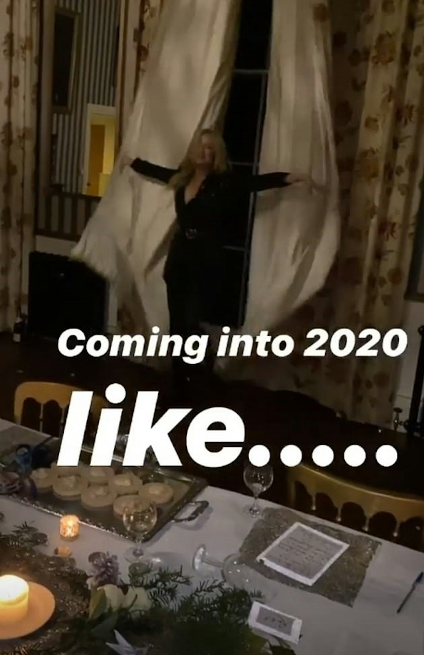Laura Whitmore hides behind curtains