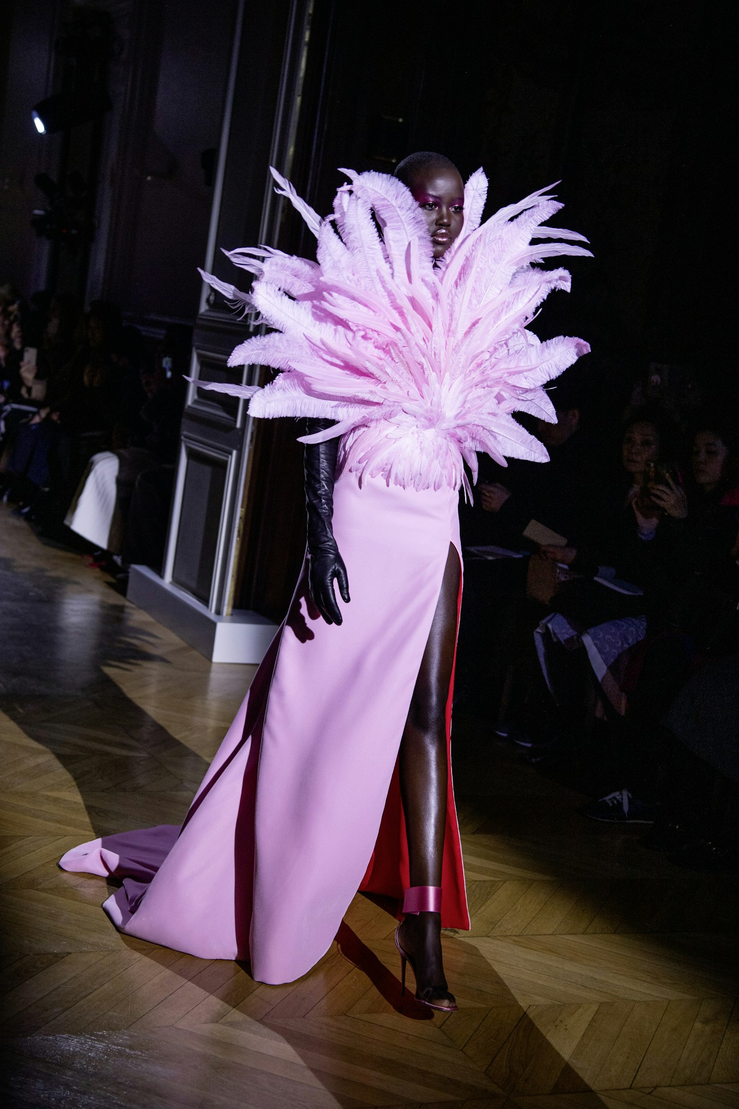 Adut Akech in pink feathered Valentino gown