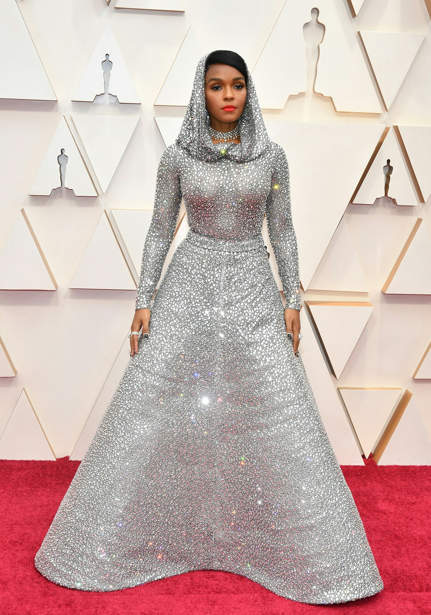 Janelle Monae wore a silver sequined Ralph Lauren gown, complete with matching hood