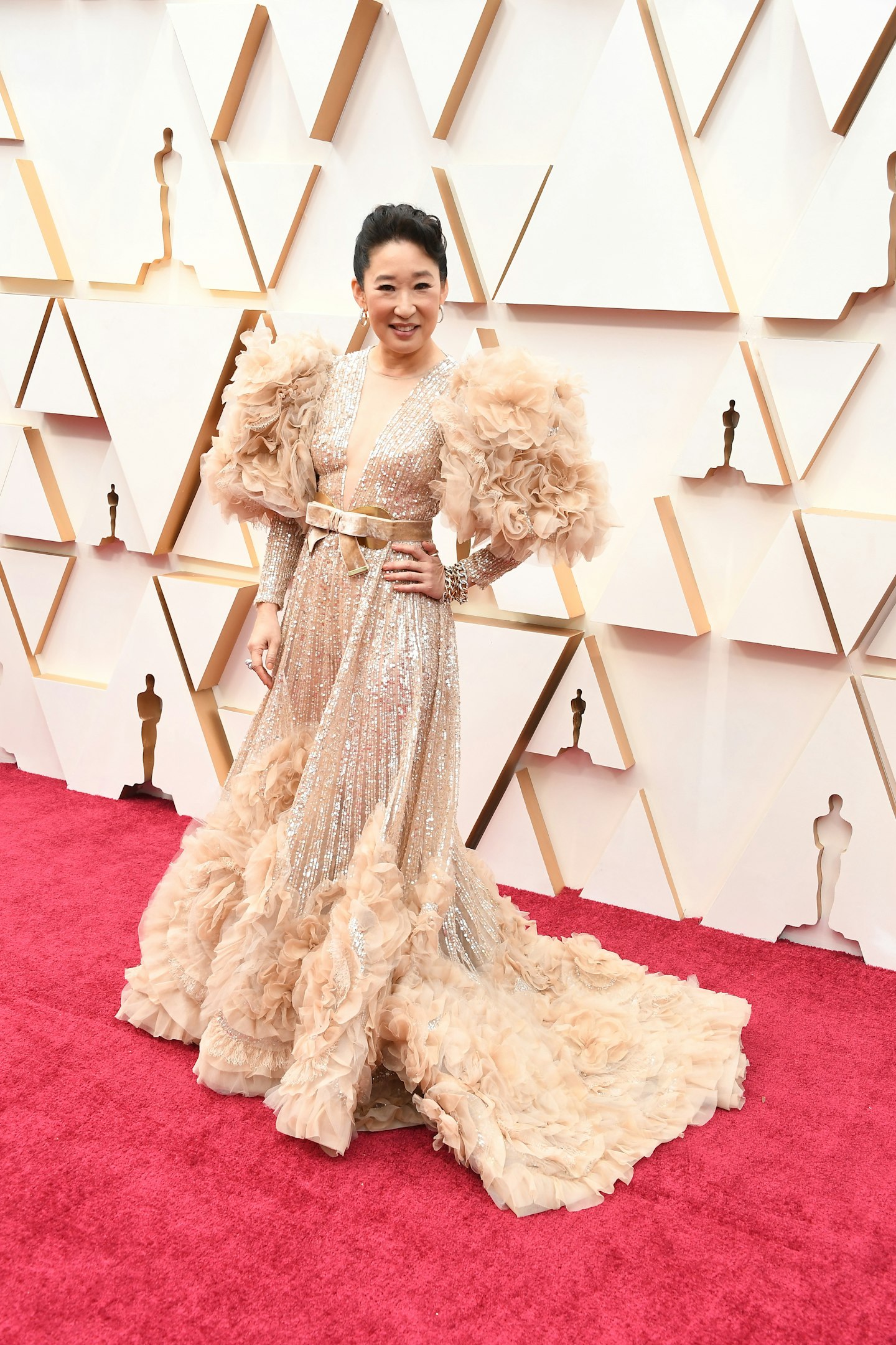 Sandra Oh wore an amazing Elie Saab gown with dramatic sleeves