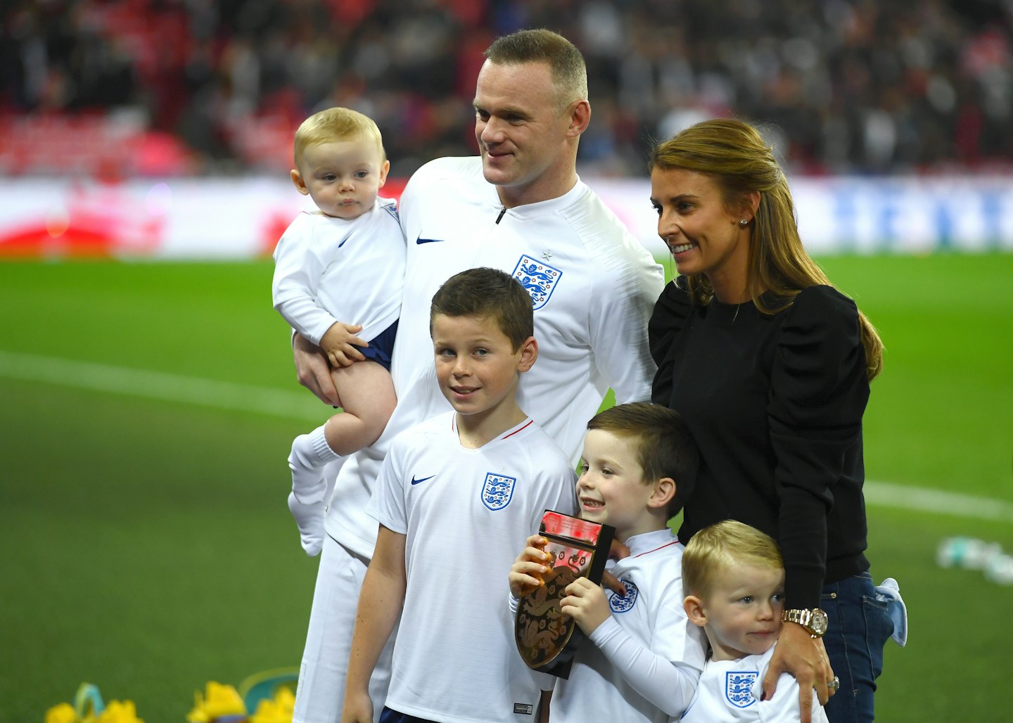 Wayne Rooney, wife Coleen and their children