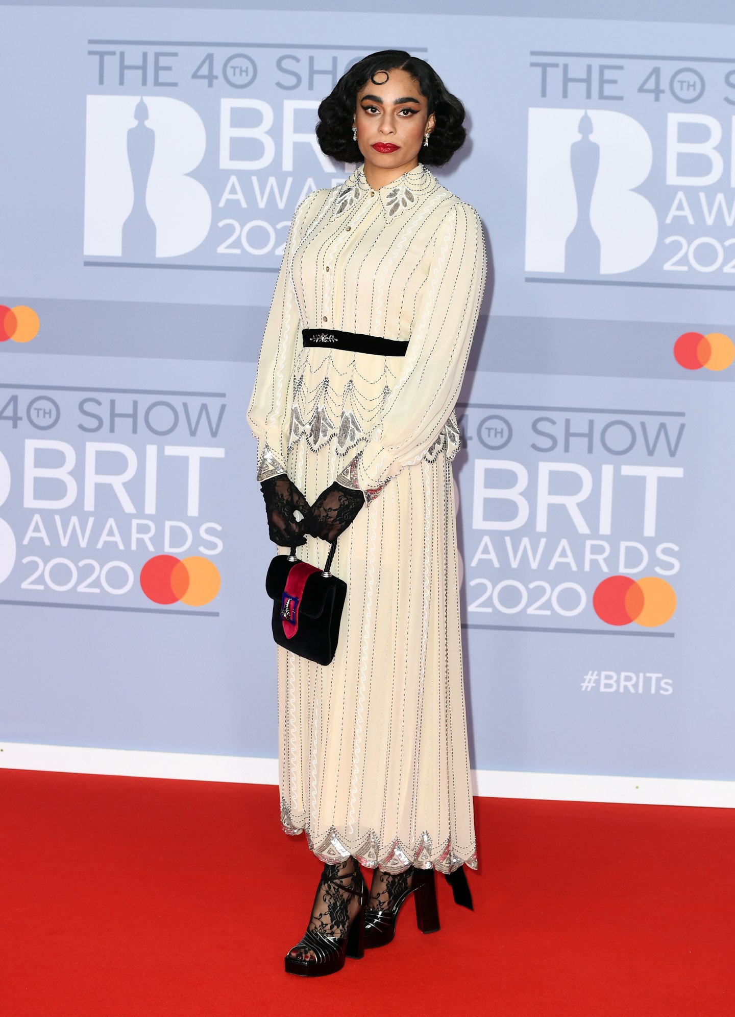 Celeste wore a vintage-looking outfit with beaded detail