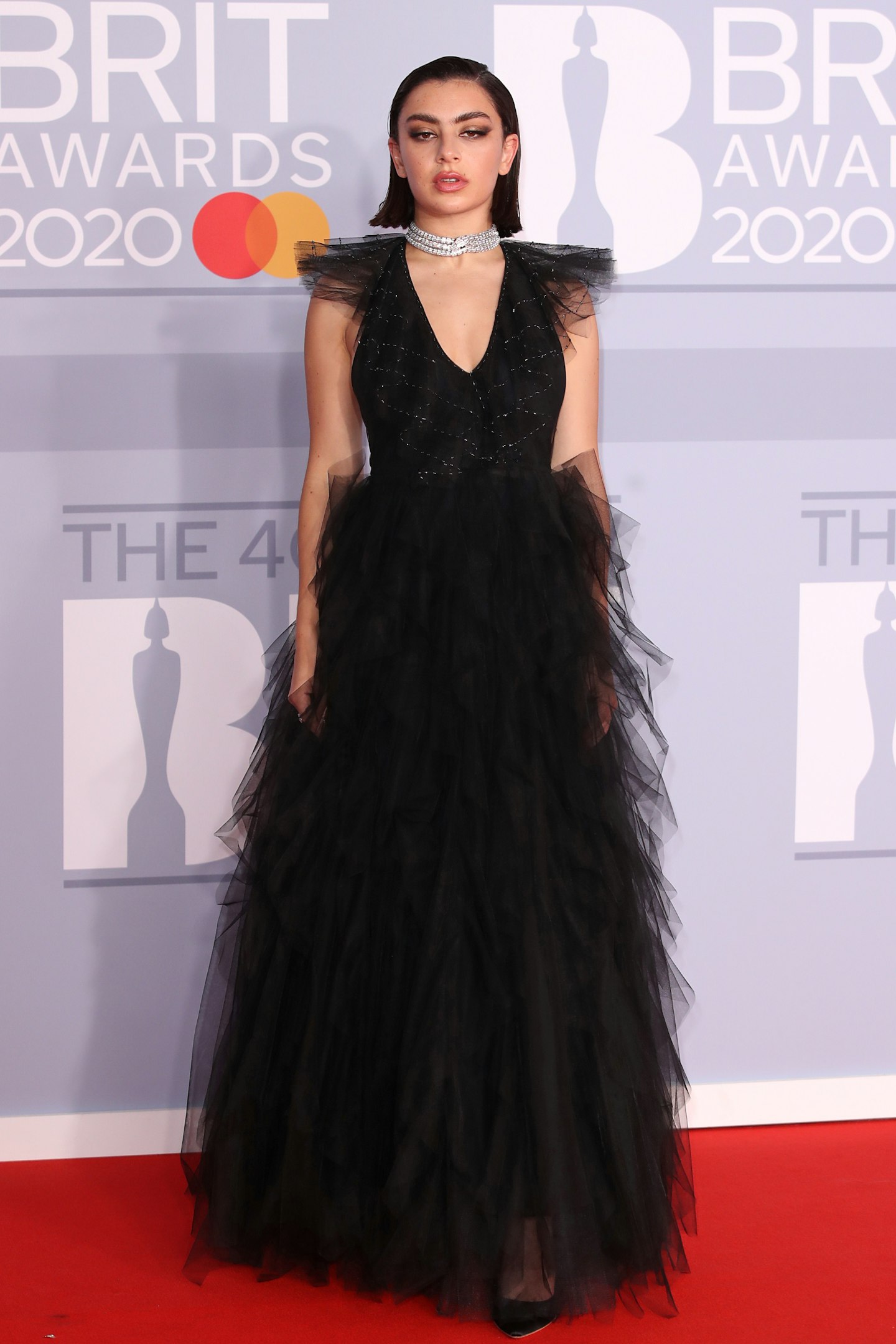 Charli XCX in a black tulle gown