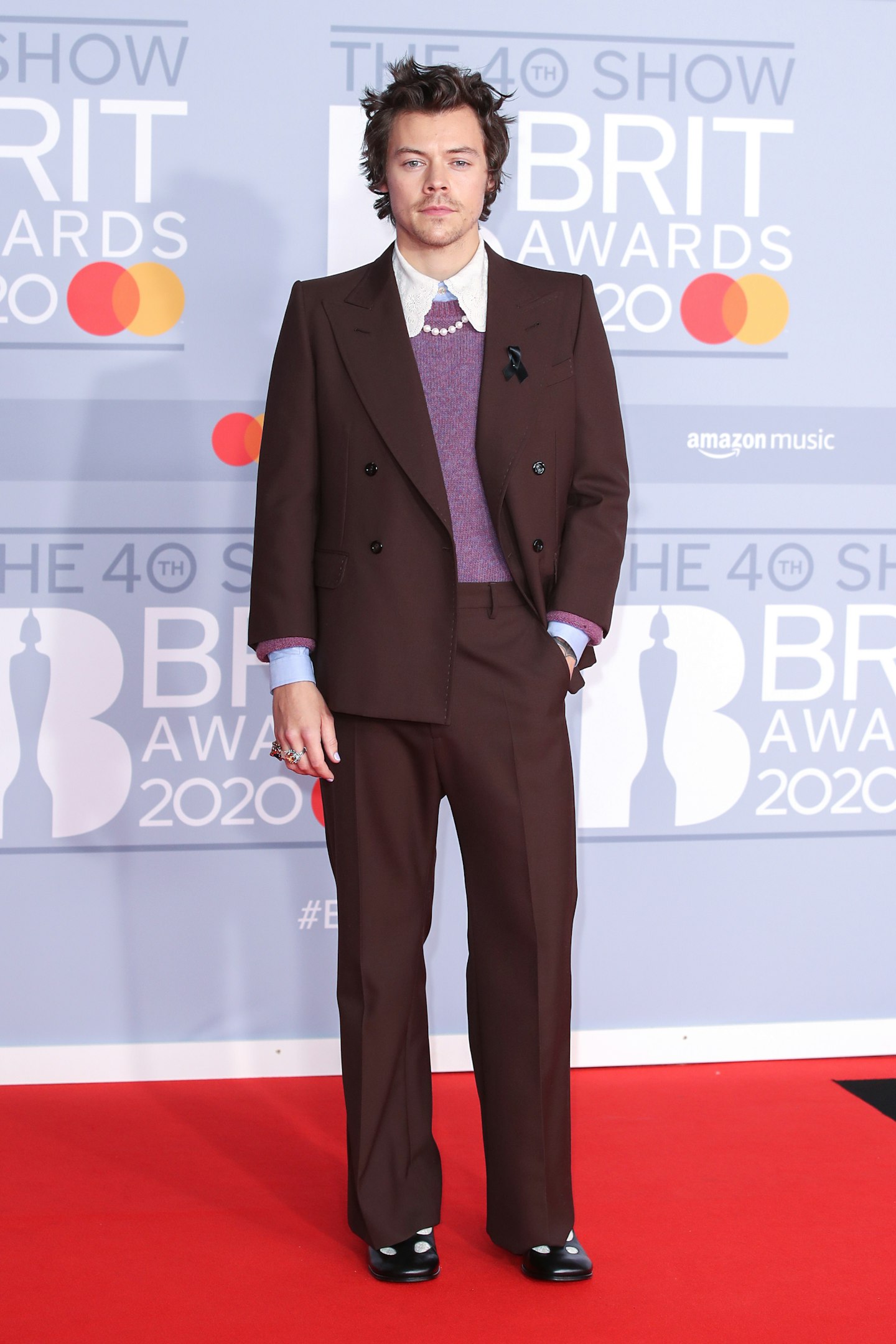 Harry Styles wearing Gucci