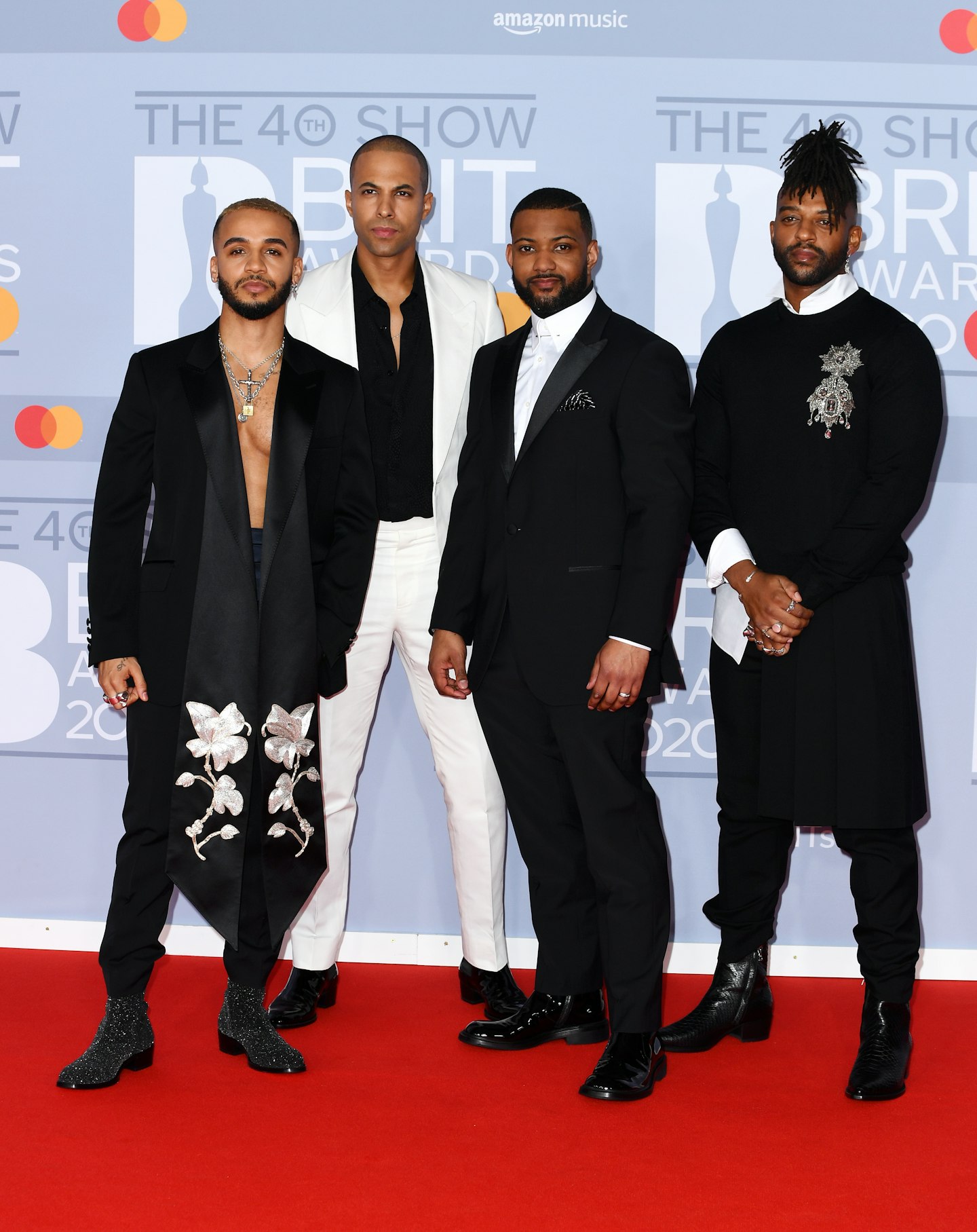 JLS returned to the red carpet in a variety of almost-matching looks