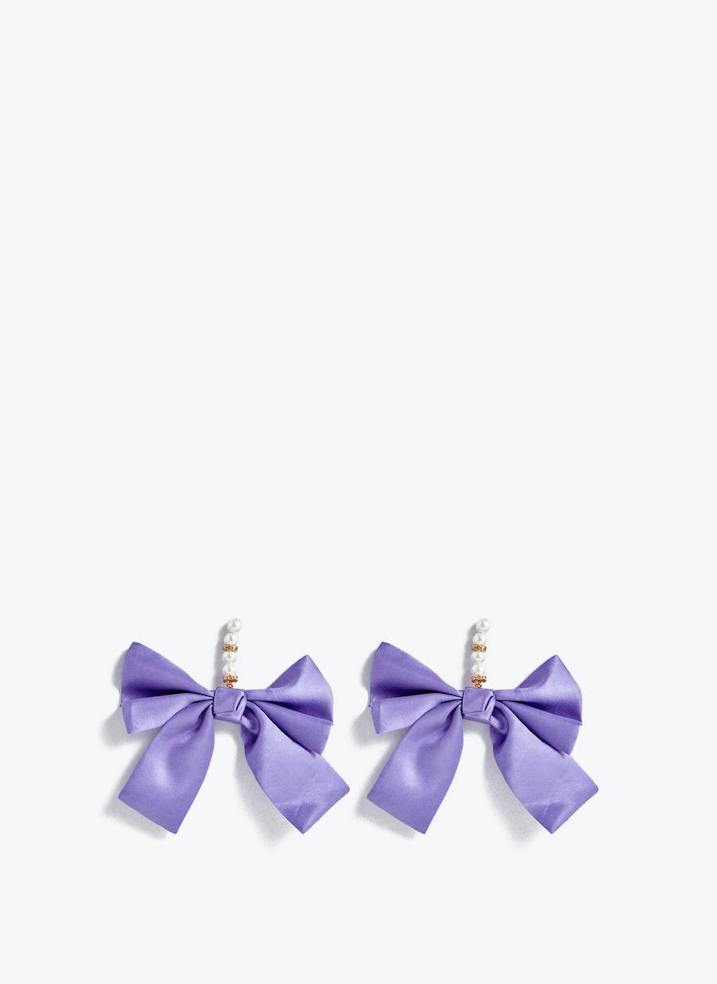 Earrings, £49, Uterque