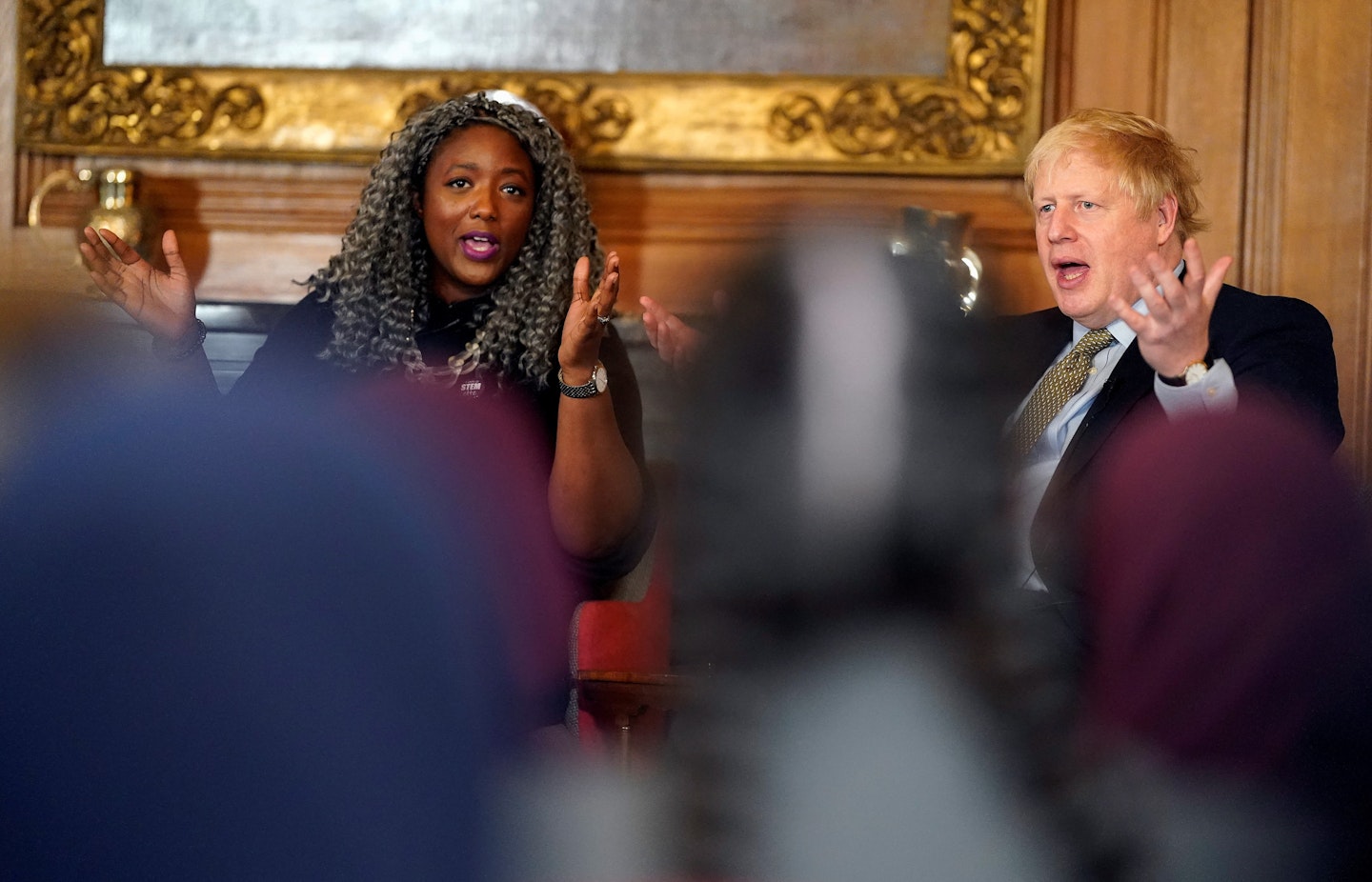 Dr Anne-Marie Imafidon and the Prime Minister speaking on an International Women's Day panel
