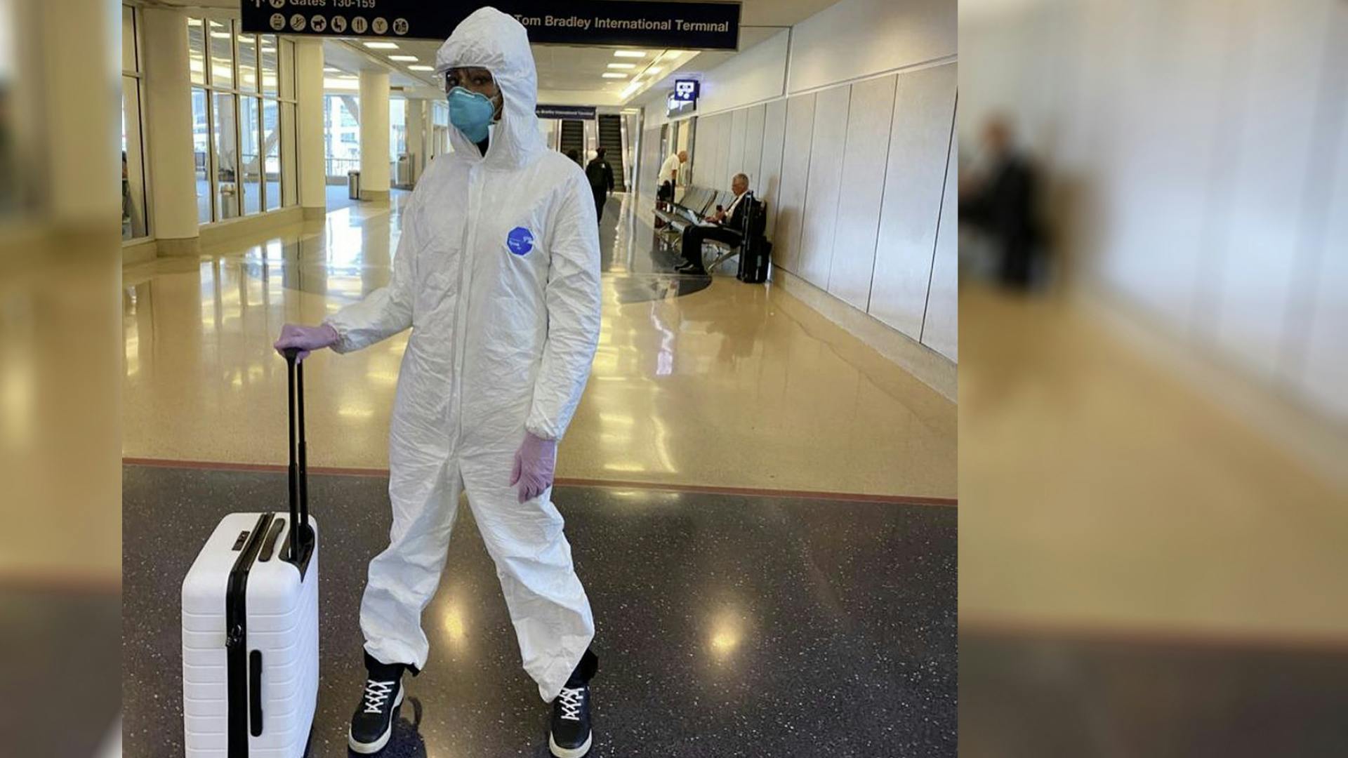 Naomi Campbell Steps Out In A Full Hazmat Suit At The Airport Amid