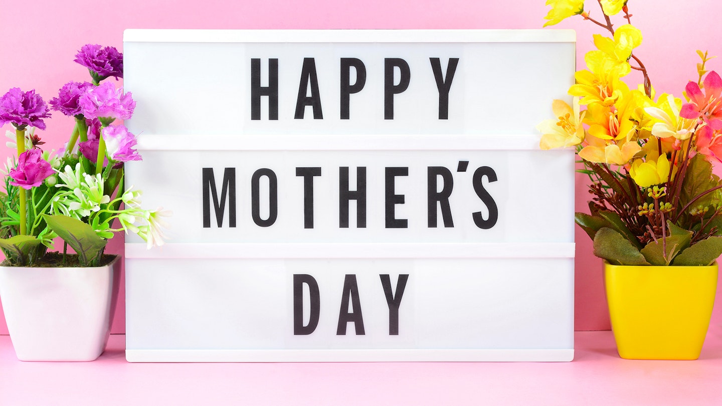 Mother's Day sign and flowers