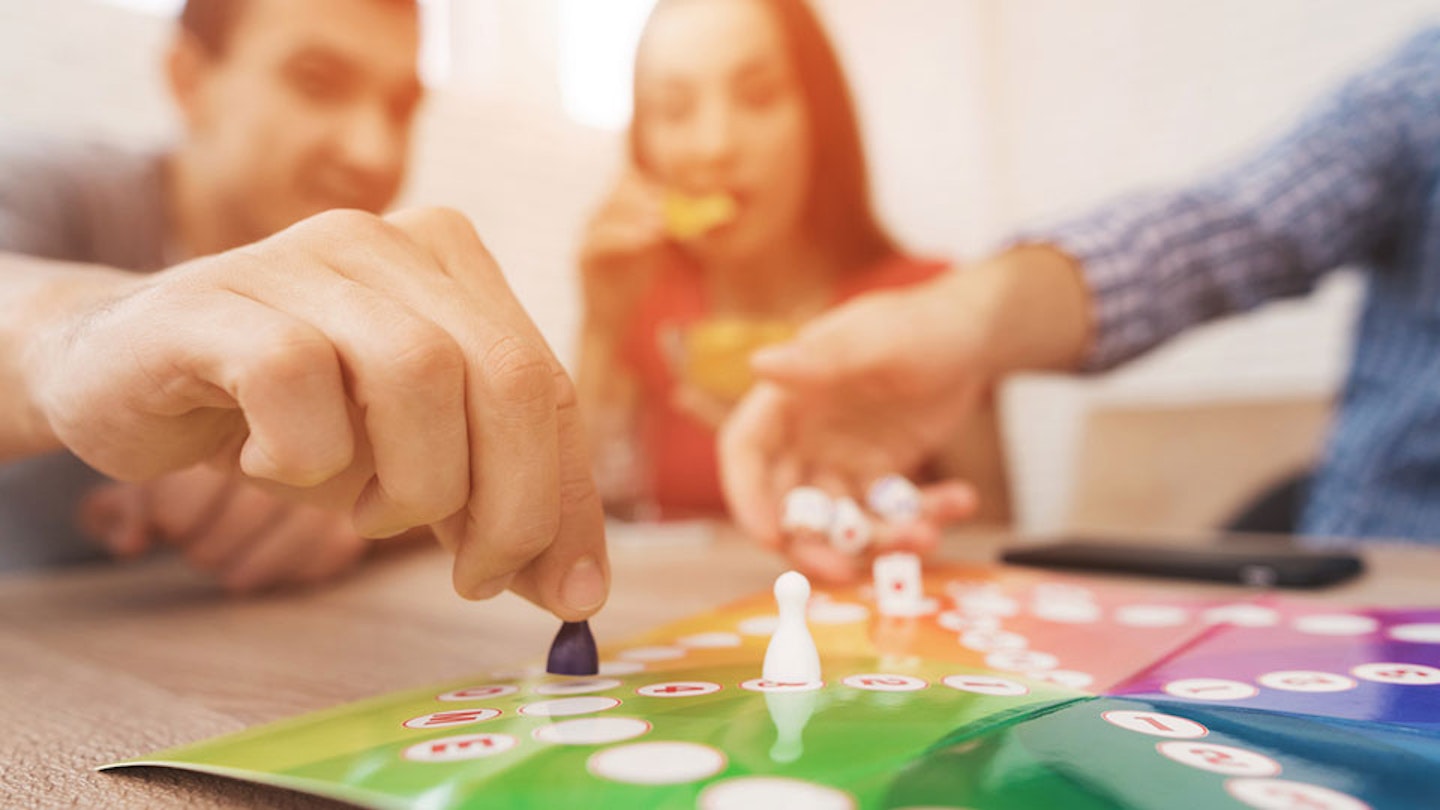 Friends playing board games