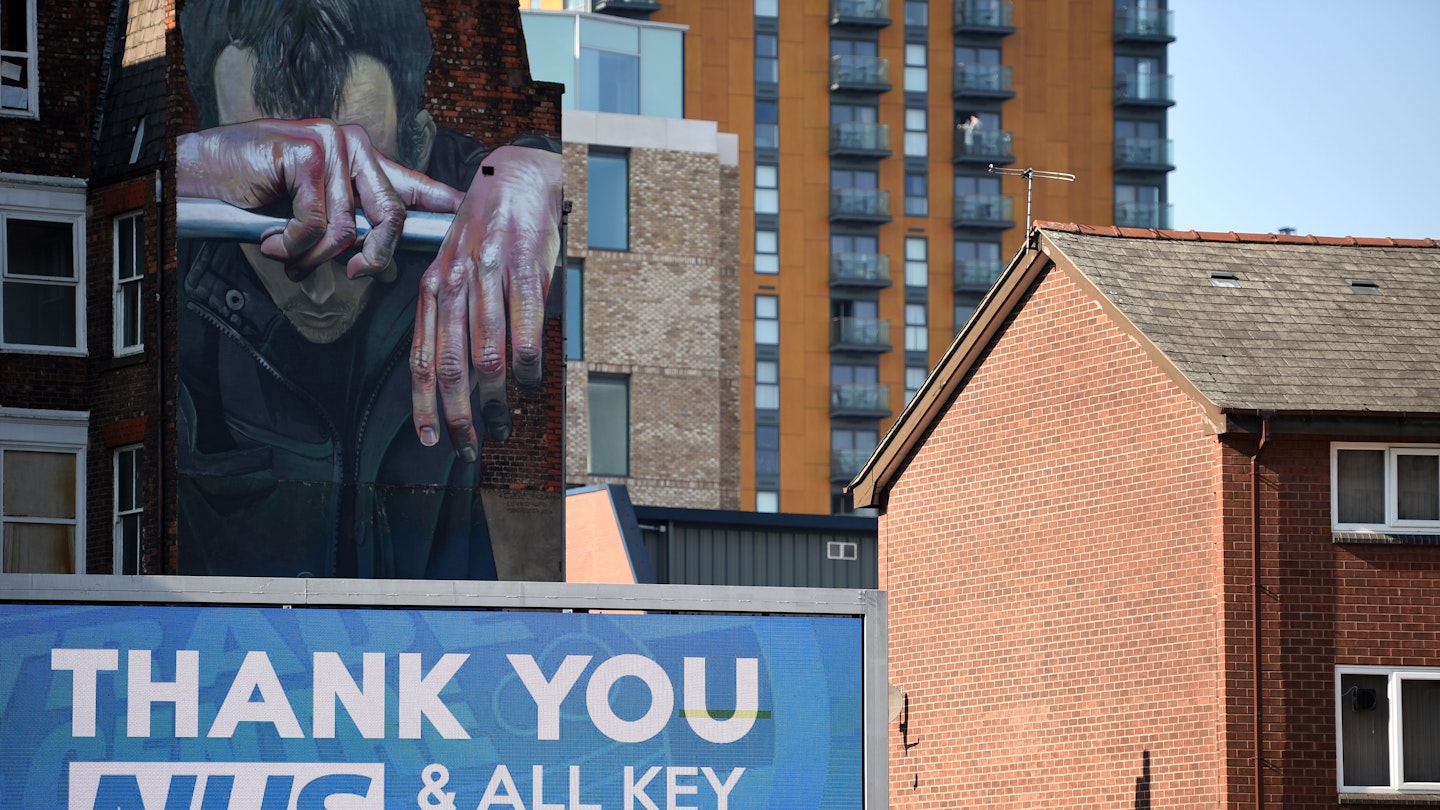 A sign thanking NHS workers is seen in Manchester, north west England on March 27, 2020. - Britain was under lockdown, its population joining around 1.7 billion people around the globe ordered to stay indoors to curb the "accelerating" spread of the coronavirus.