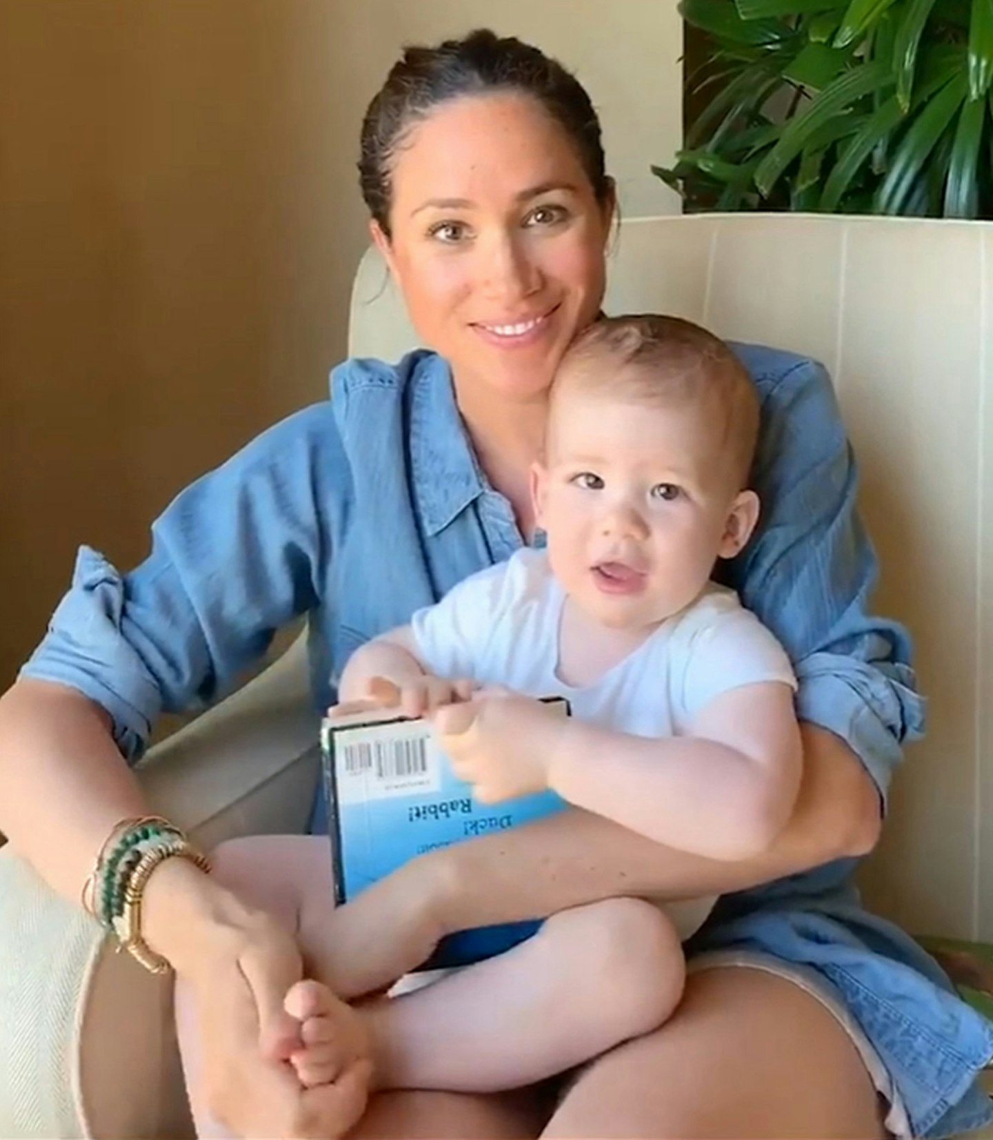 May 2020: Meghan reads to Archie on his first birthday