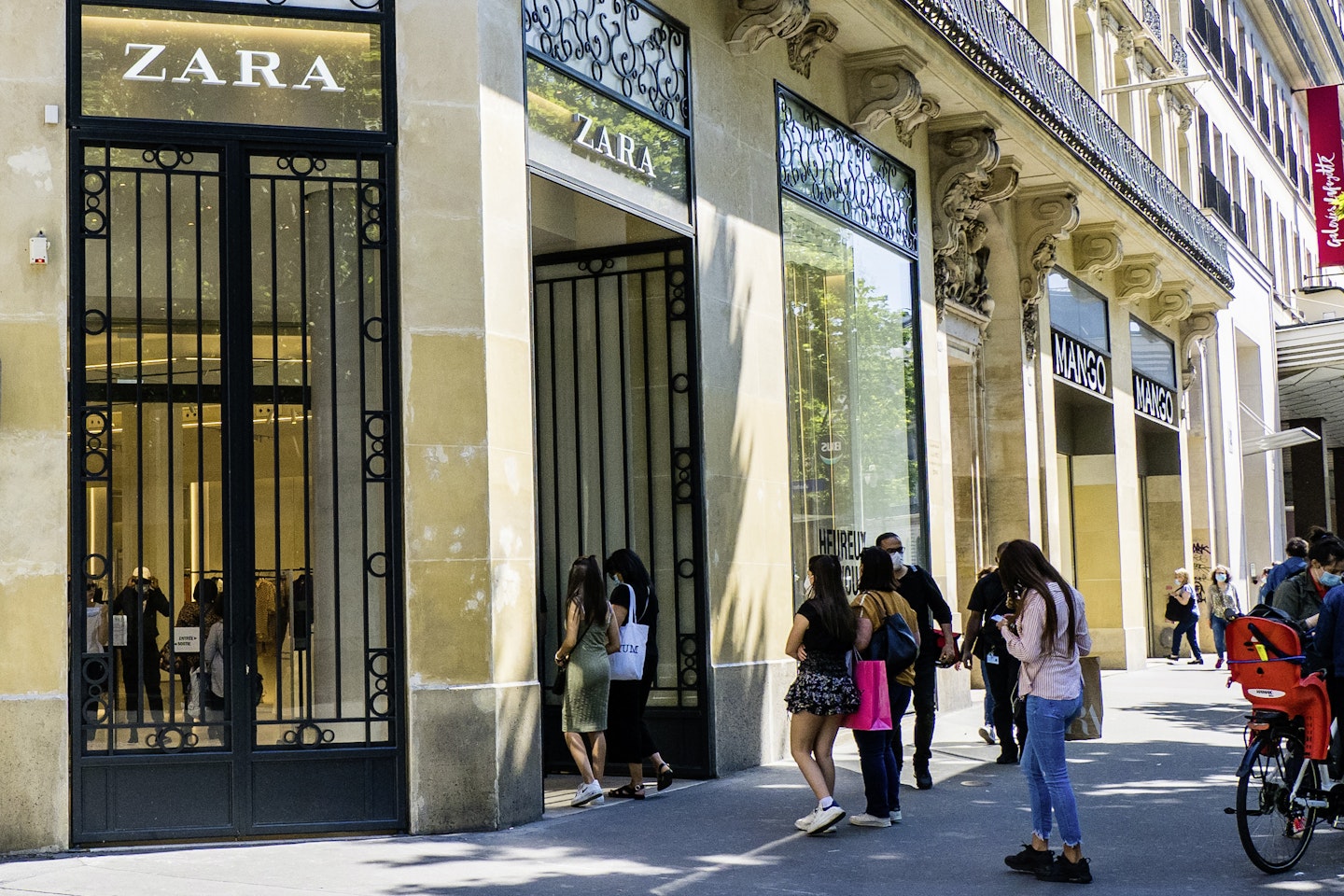 Queueing outside a reopened Zara in Paris