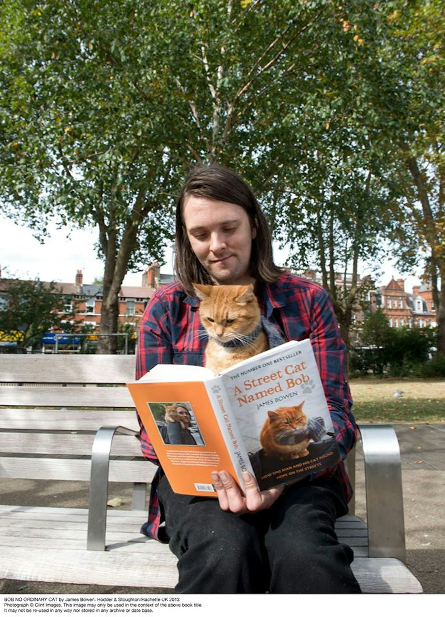 Street Cat Named Bob and James reading