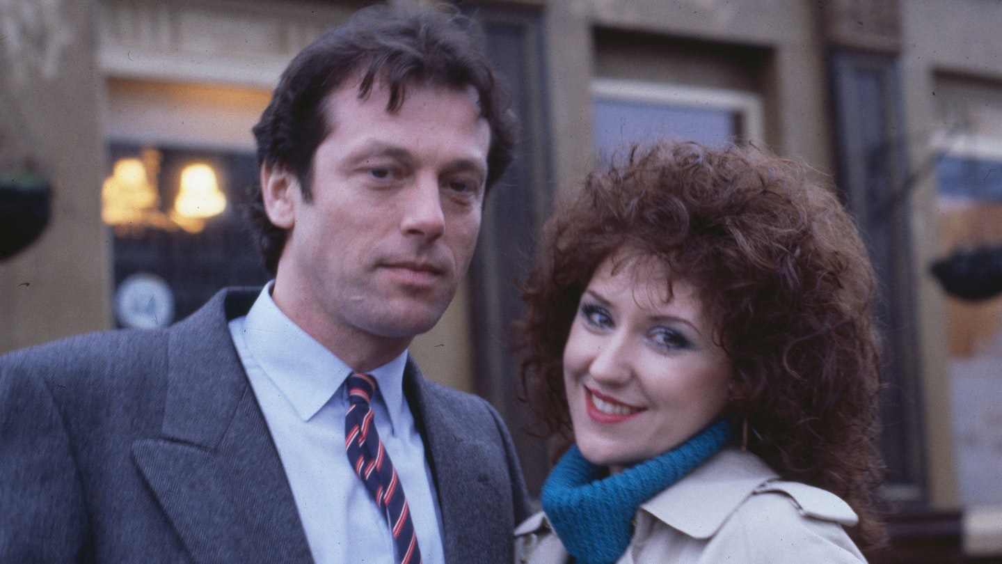 Leslie Grantham and Anita Dobson pictured on the set of the BBC soap opera 'EastEnders', December 18th 1985