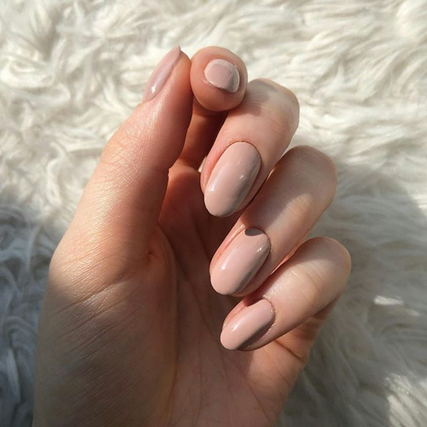 nude nail polish manicure