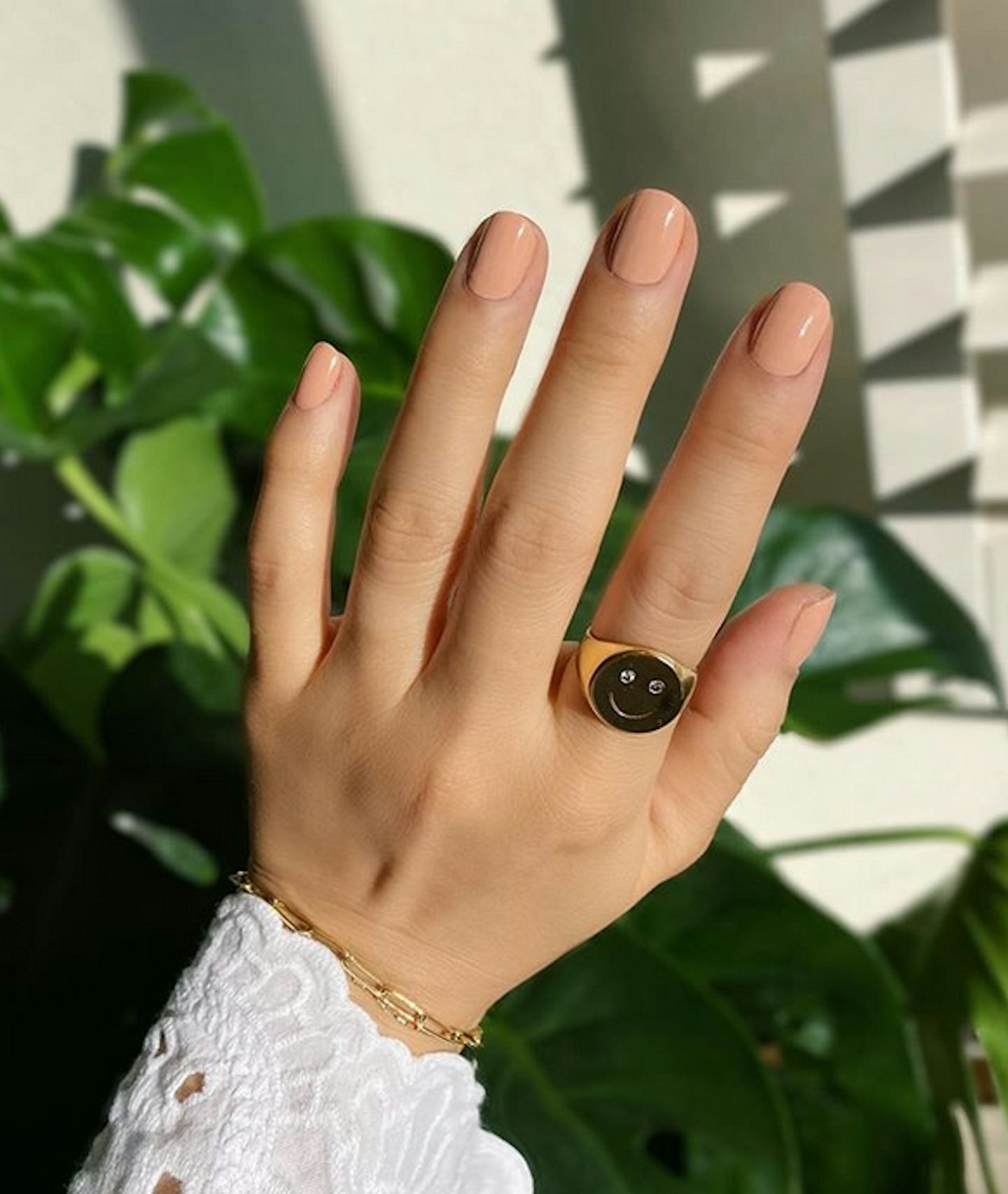 nude nail polish manicure