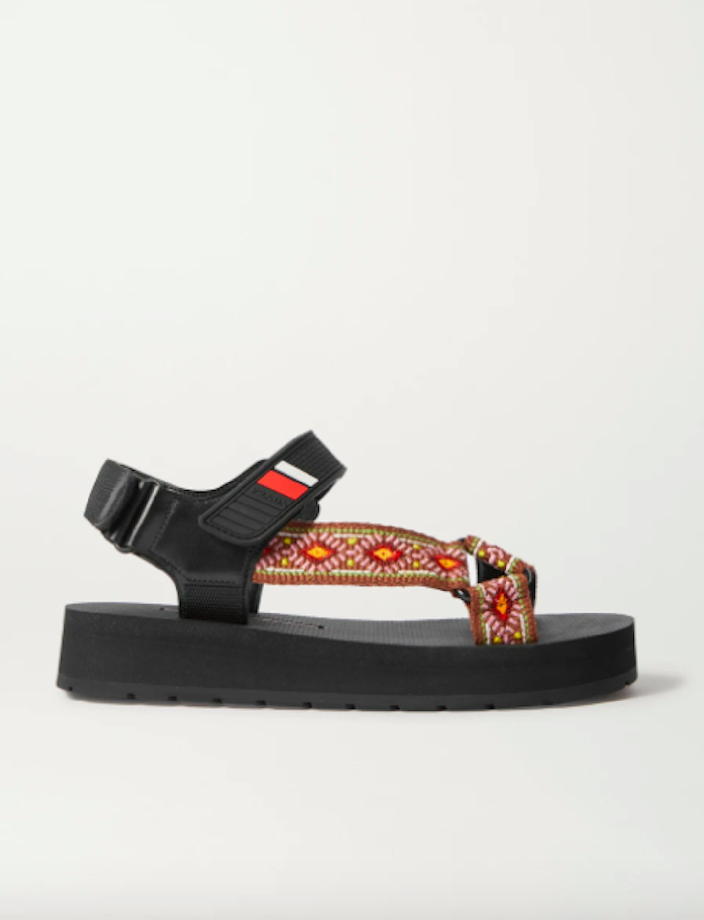 Prada, Logo Rubber And Leather Canvas Sandals, £460 at Net-a-Porter