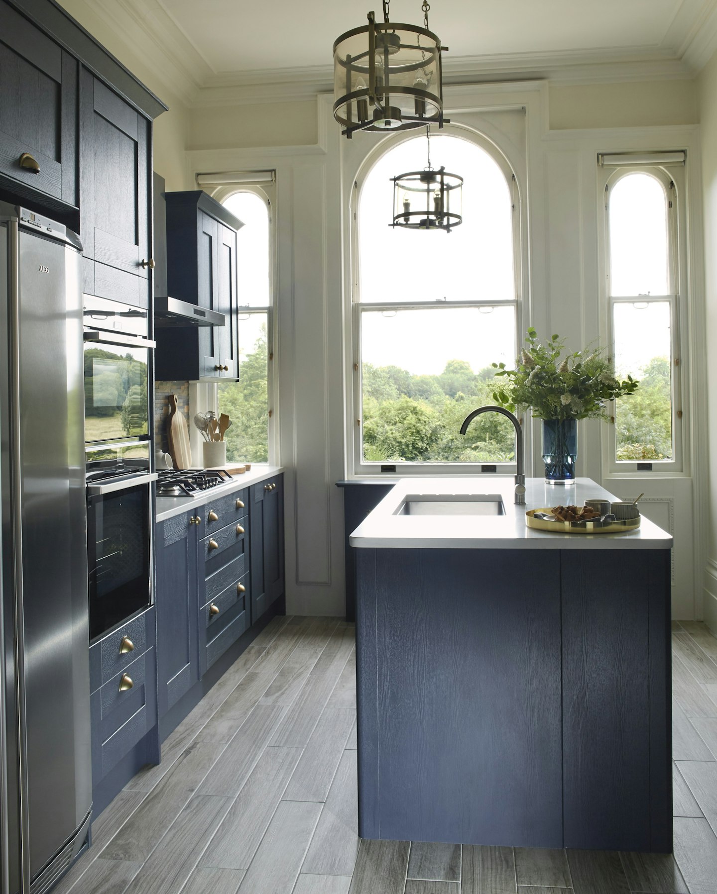Milton Midnight Kitchen with navy cupboards and white marble tops