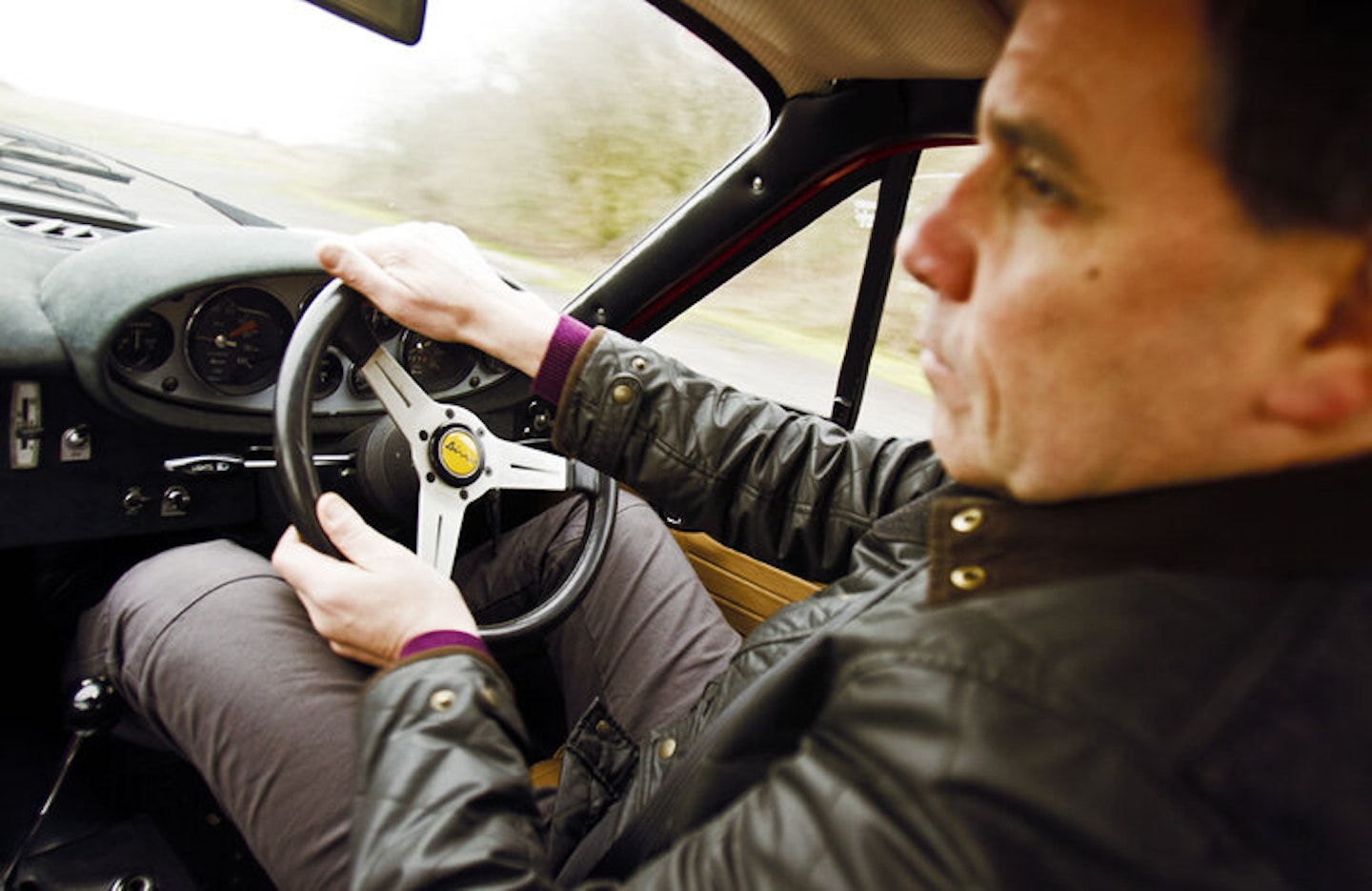 John driving Dino
