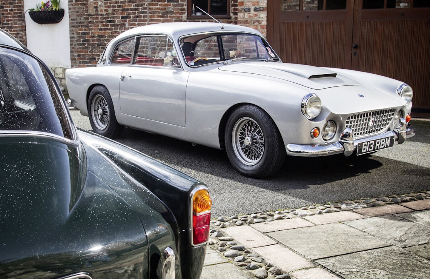 Silver AC Greyhound is Bristol-powered; the green one has a Ford Zephyr engine