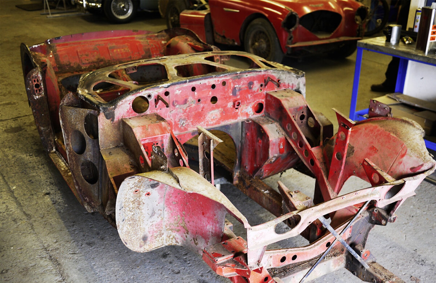 Total strip-down revealed lots of rust and holes, but the chassis was salvageable with plenty of work