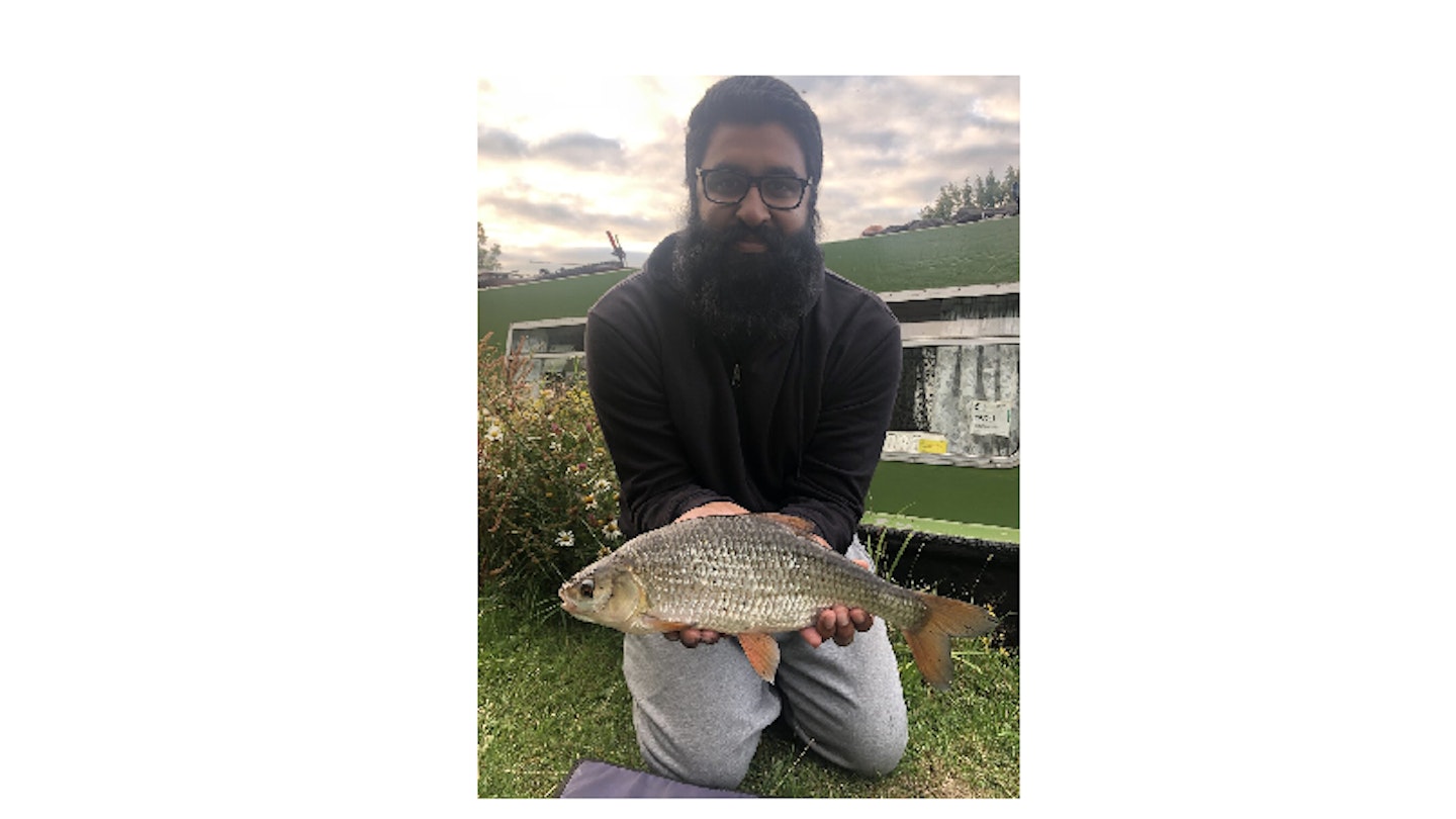 Jag Bains and his 2lb 4oz canal roach