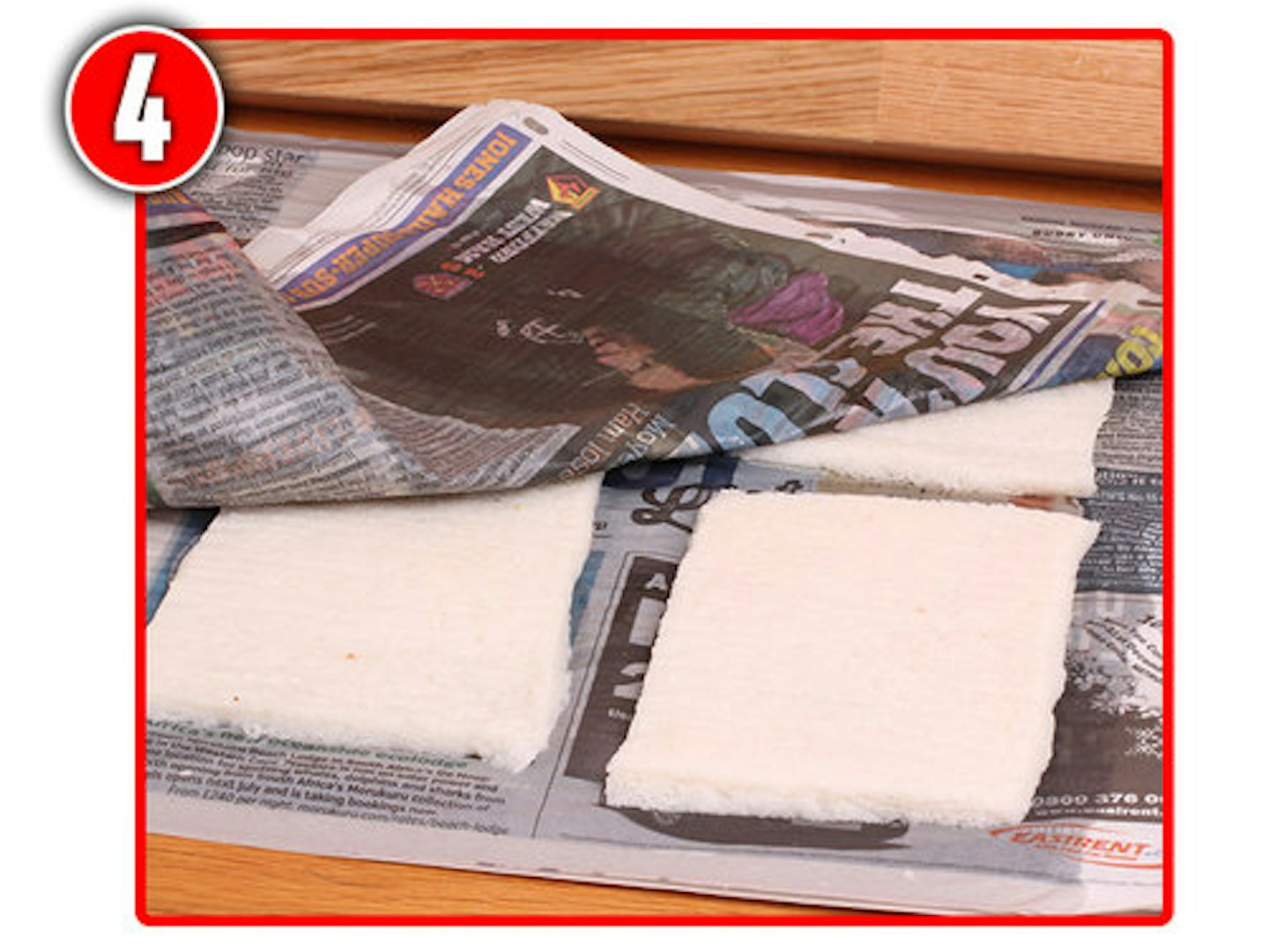 Lay the wetted slices of bread on a few sheets of newspaper. 