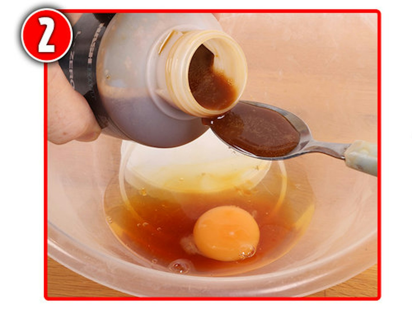 Crack four large eggs into a mixing bowl and add the liquid additives and food colouring.  