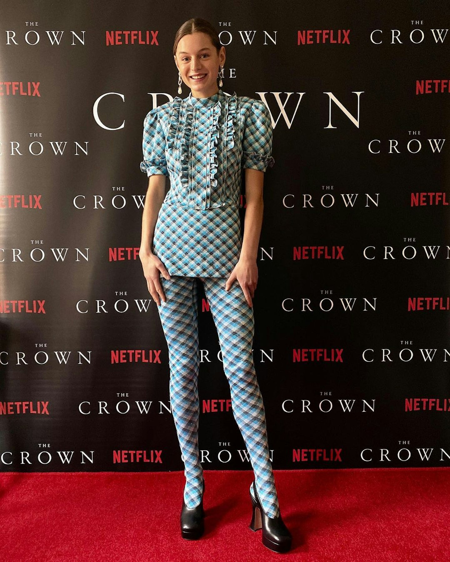 Emma Corrin, the young Princess Diana, wore a custom Miu Miu look