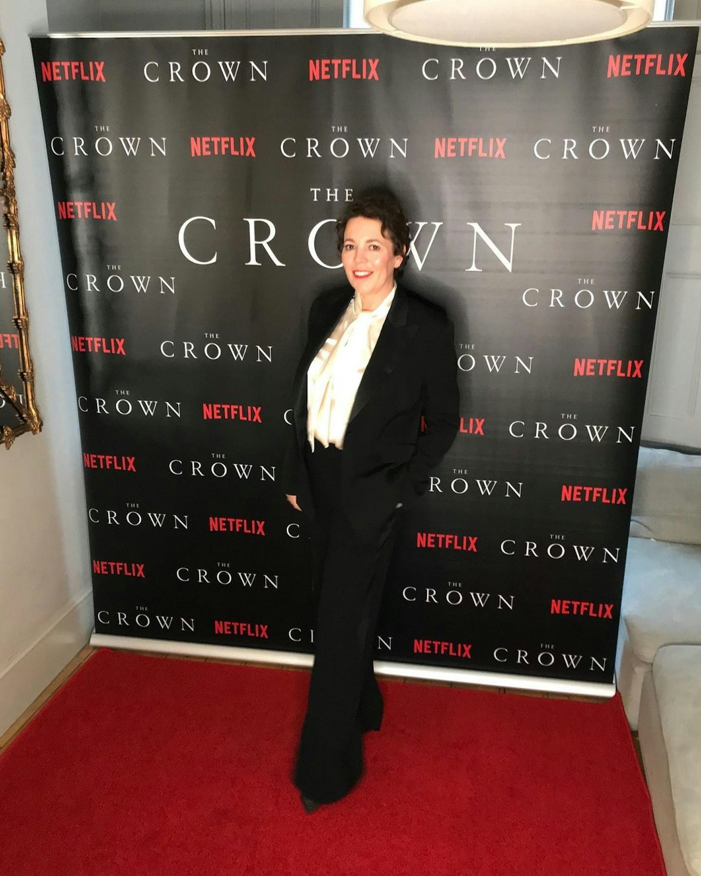 Olivia Colman, the new Queen Elizabeth II, wore a Paul Smith suit
