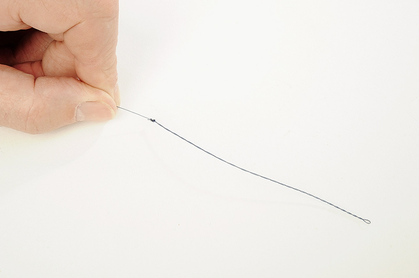 You’re now left with a twisted section of line of around 6ins long, called a boom. Trim the tag end to reduce line spin when reeling in.