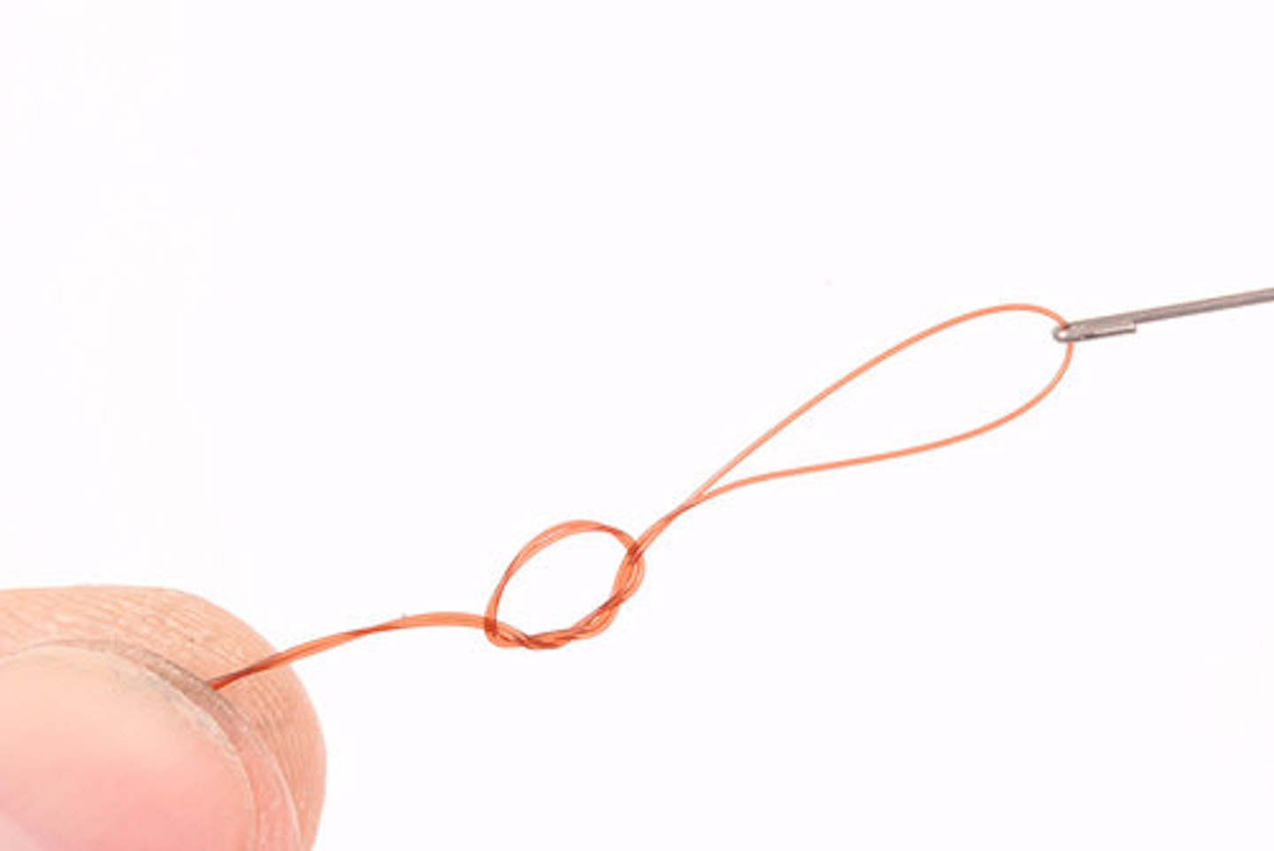 3. Tie a double overhand loop knot in the end of the mainline. The loop should be about 2cm in length. The hooklength will later be attached to this 