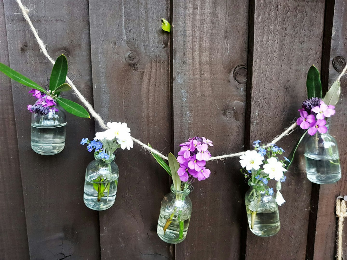Craft Ideas | Decorate Your Garden With A Floral Bottle Garland