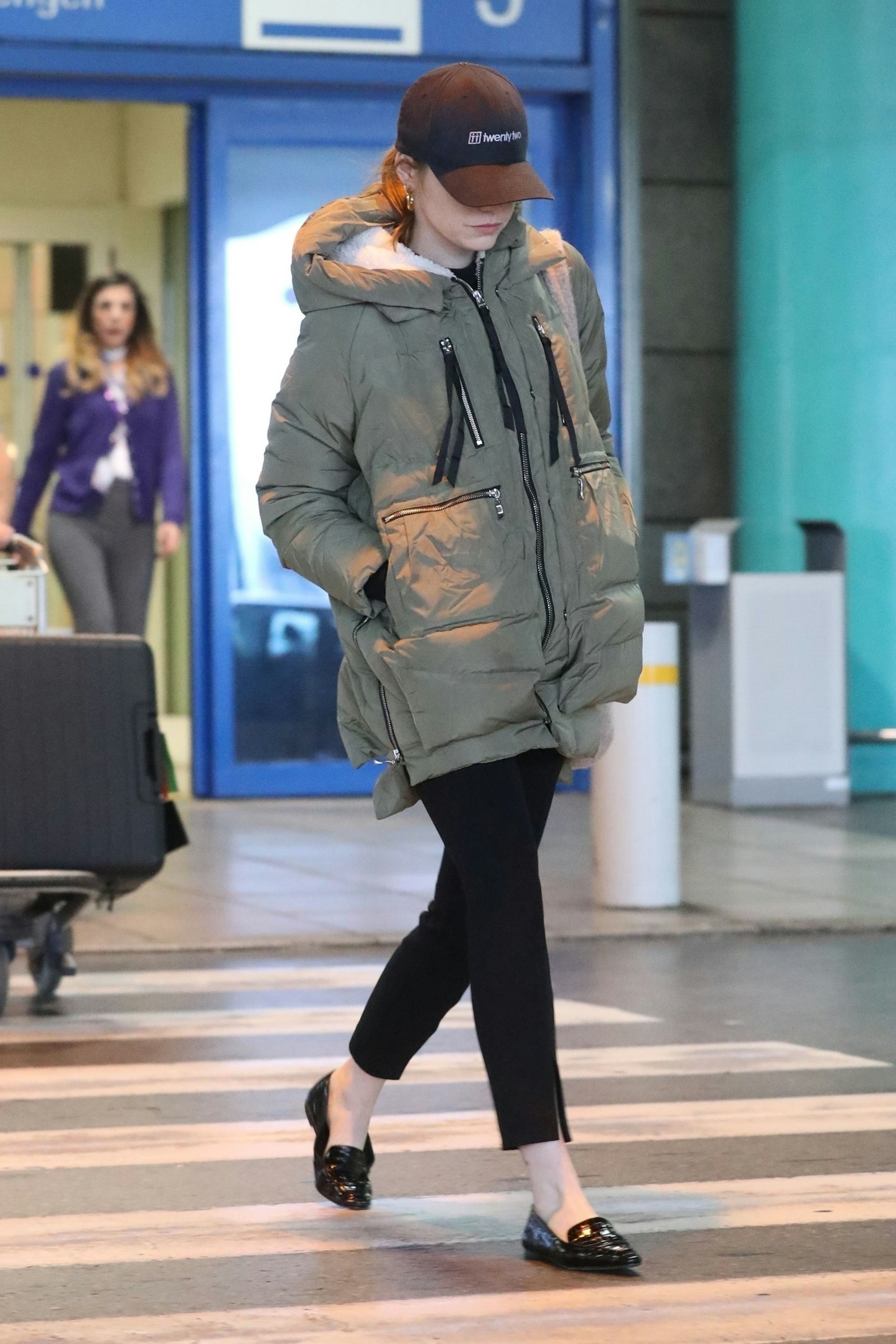 Emma Stone in her Orolay coat 