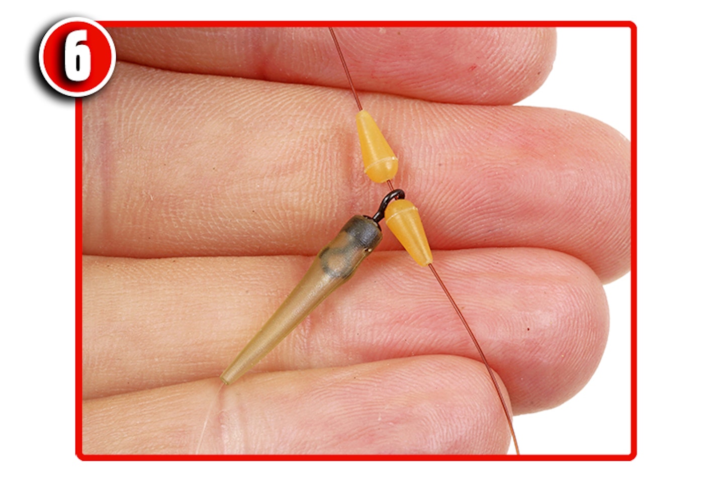 Thread on the hooklength swivel, followed by a second Line Stop leaving a 5mm gap