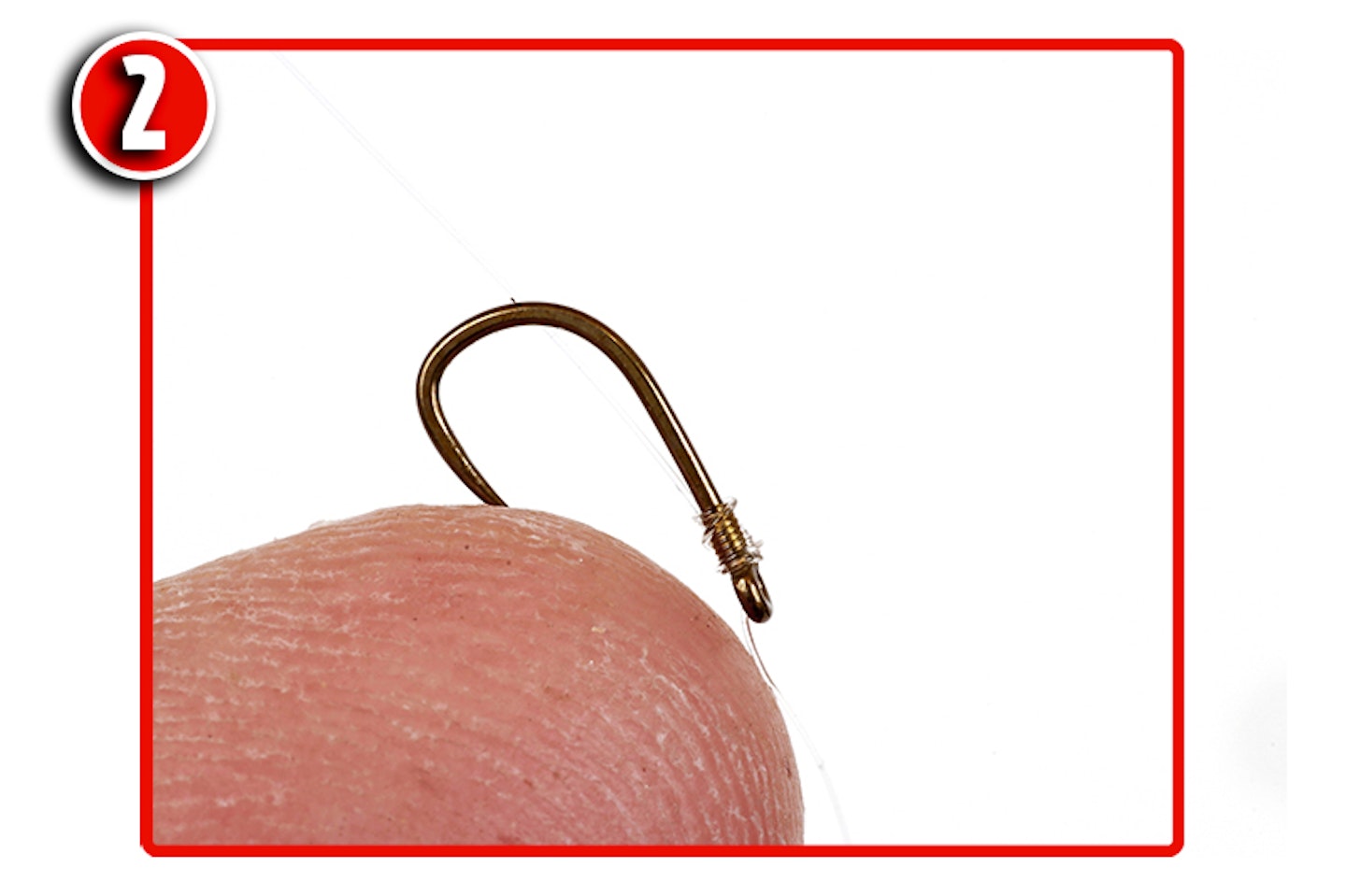 Tie on the eyed hook using a through-the-eye whipping knot with 12 turns, for a great angle