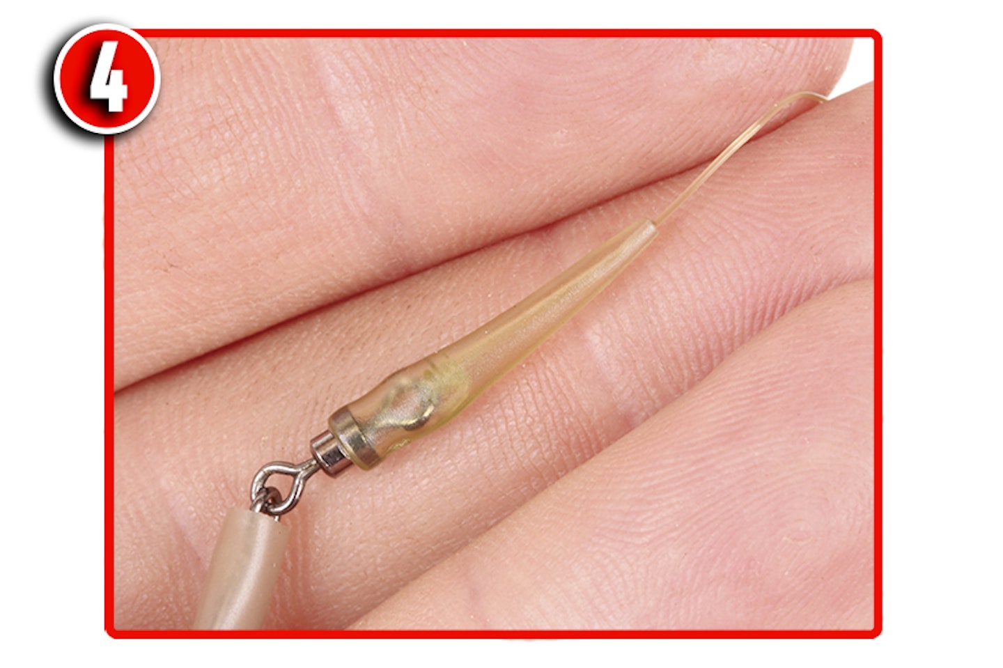 Slide a mini rig sleeve on to the mainline and then tie on a medium-sized Oval feeder  