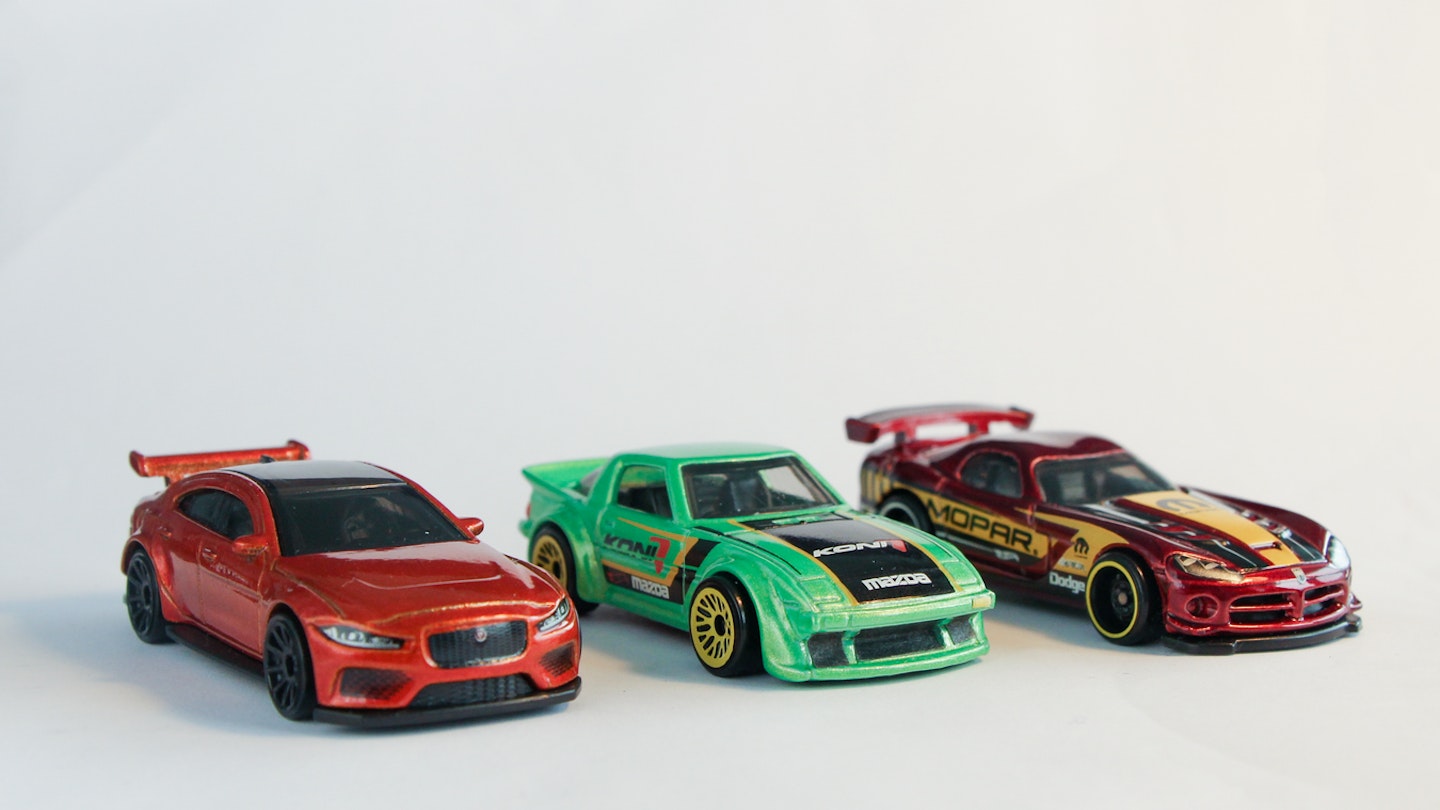 Three toy cars as gifts for young petrolheads