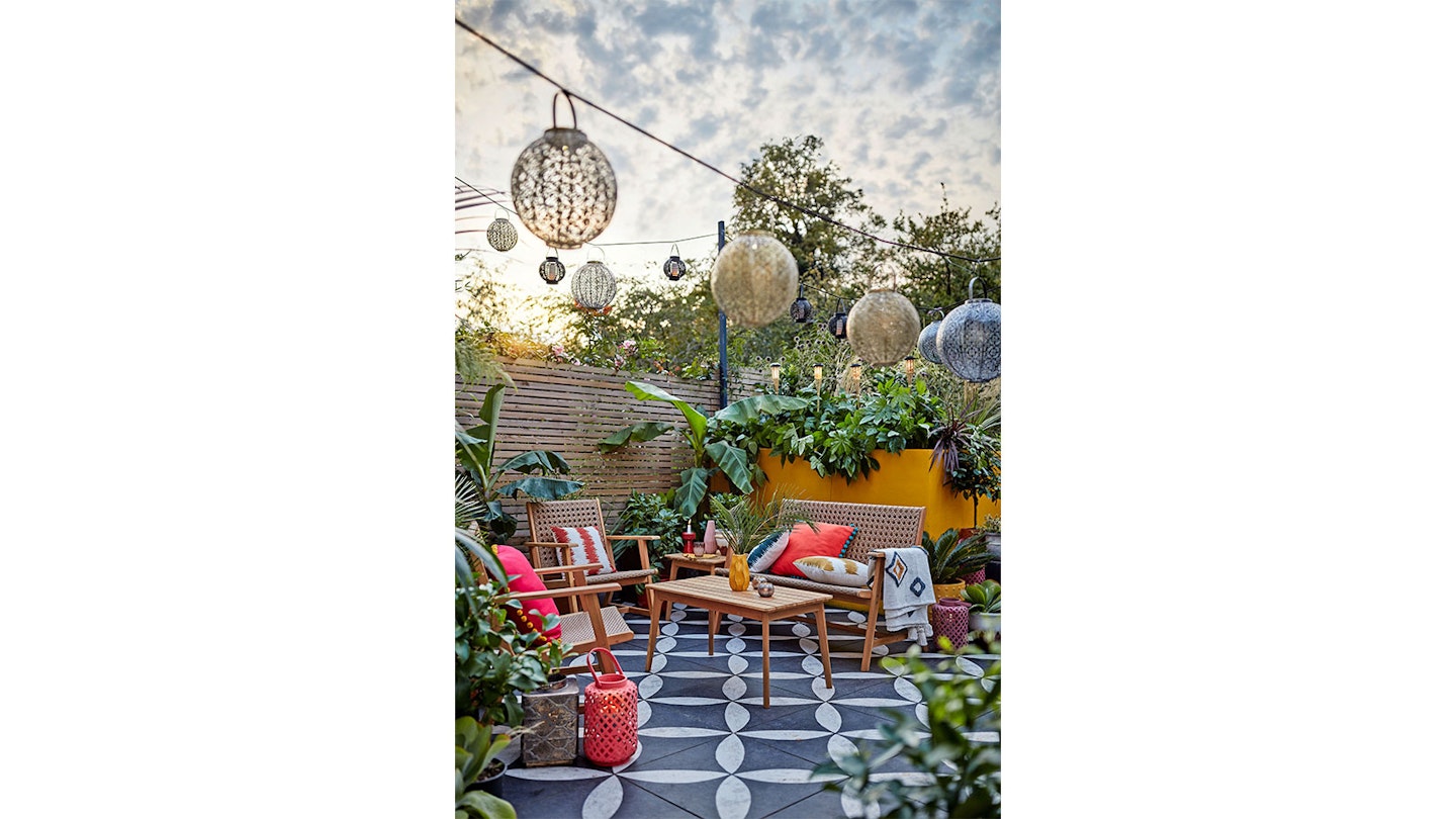 colourful patio with overhanging globe lights