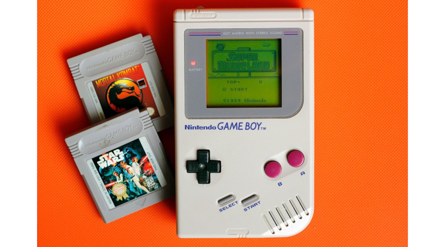 Nintendo Game Boy console original with orange background