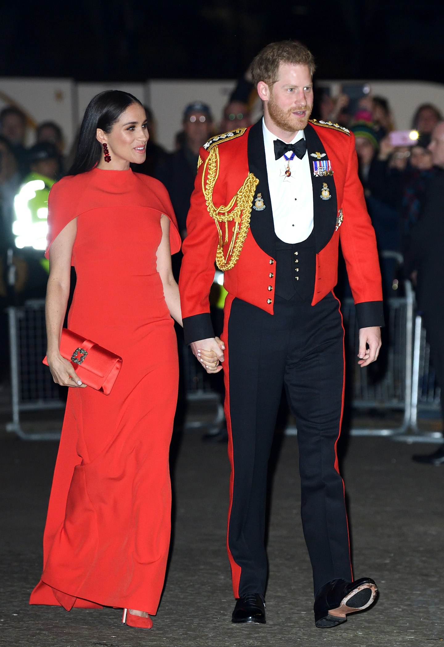 Meghan Markle and Prince Harry all in red