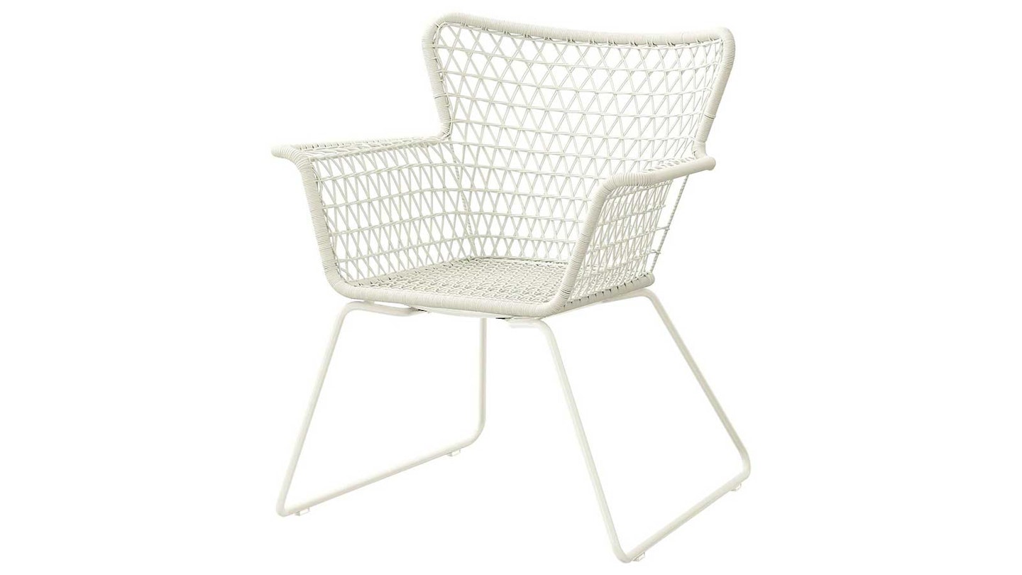 white rattan look outdoor chair