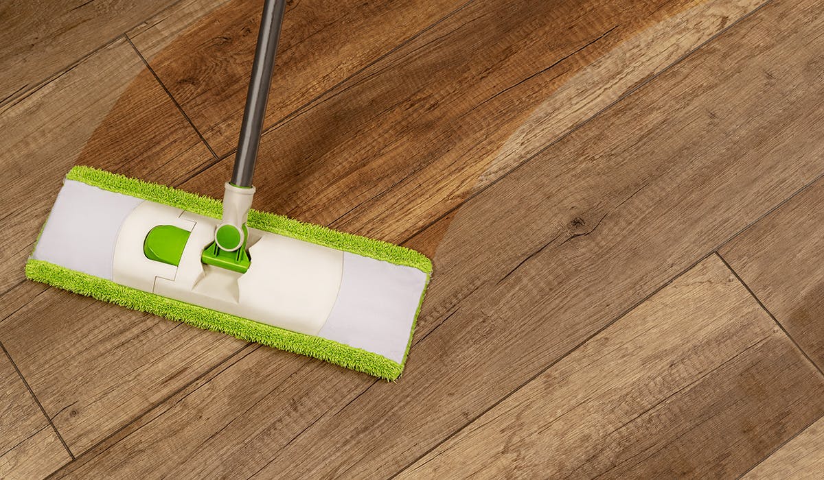 Enzymatic cleaner outlet for hardwood floors