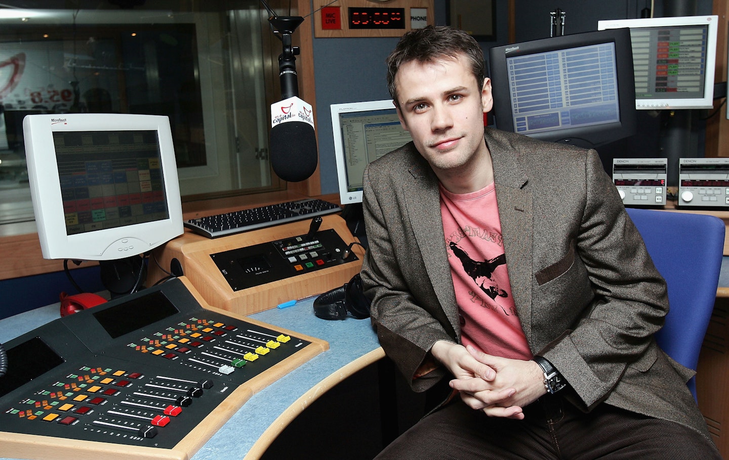 Richard Bacon poses at a photocall to announce his new role as host of Capital FM's Drive Time at Capital FM Leicester Square, shot on March 2, 2005 in London, England.