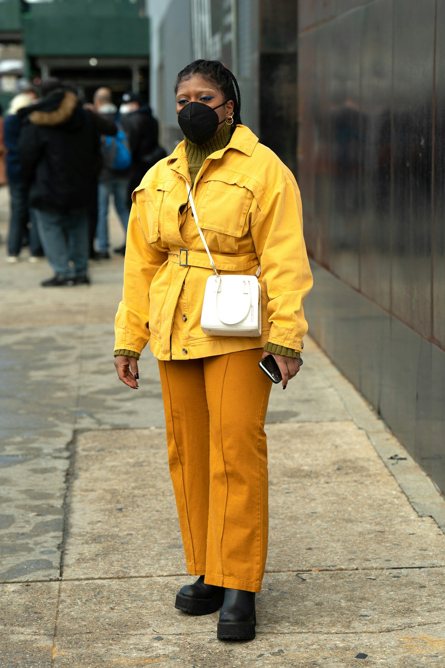 A woman wearing top-to-toe yellow at NYFW