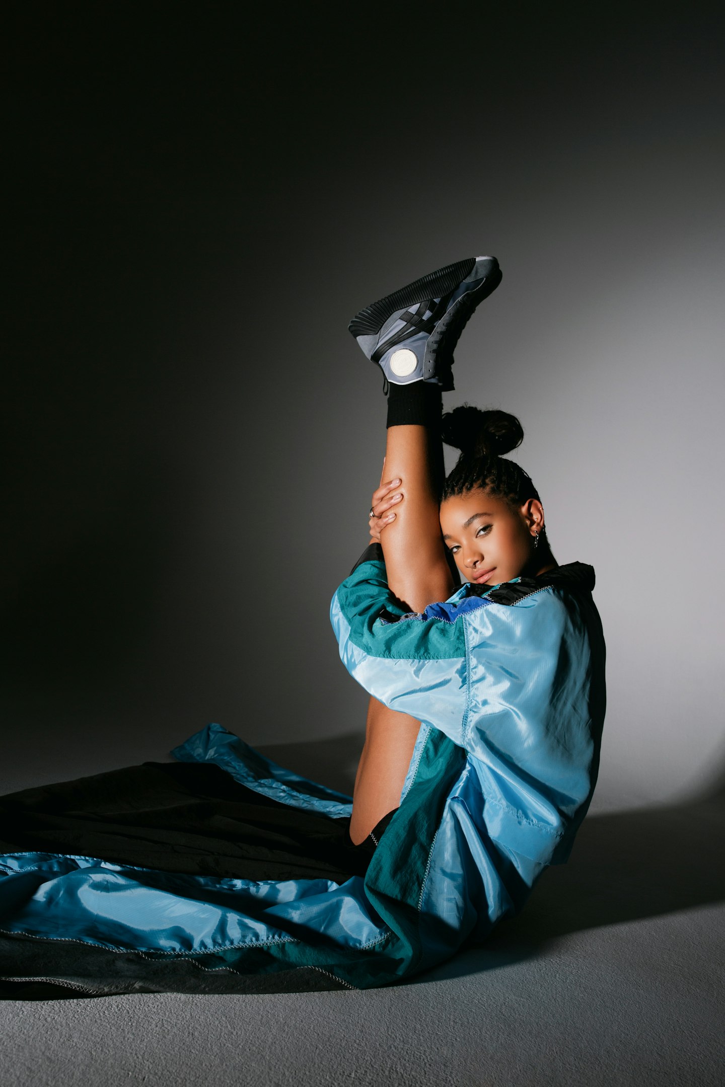 Willow Smith wearing a blue coat from Onitsuka Tiger