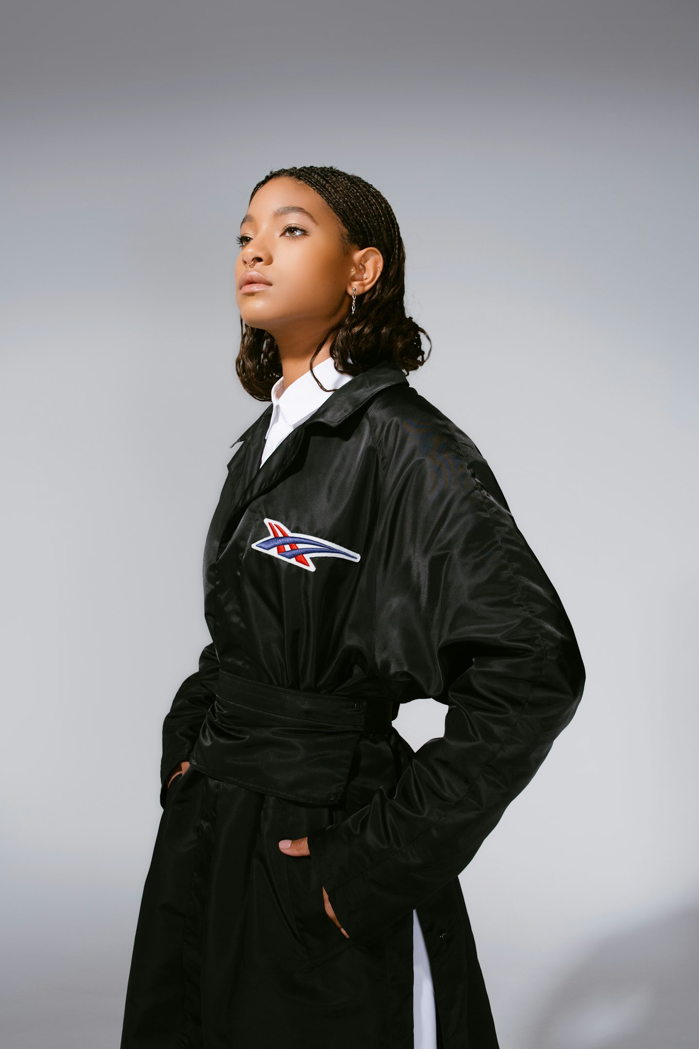 Willow Smith wearing black coat from Onitsuka Tiger