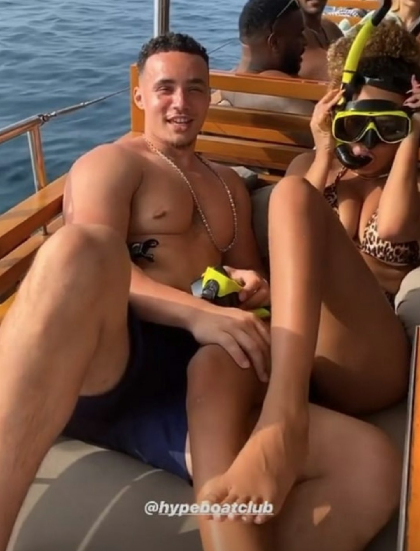 Amber Gill and Rory Colhoun cuddled up on boat in Thailand, January 2020.