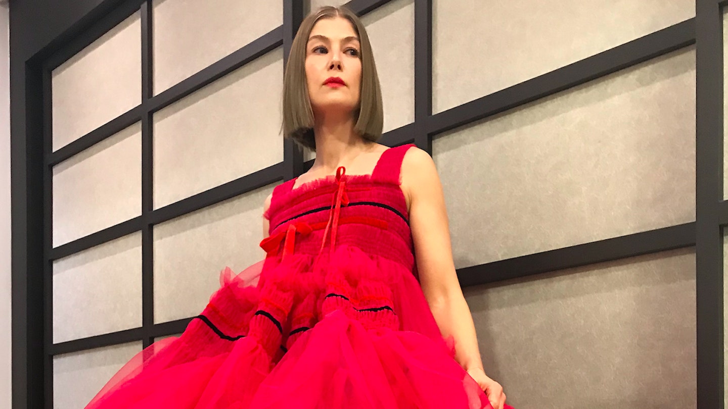 Rosamund Pike wearing a red dress from Molly Goddard
